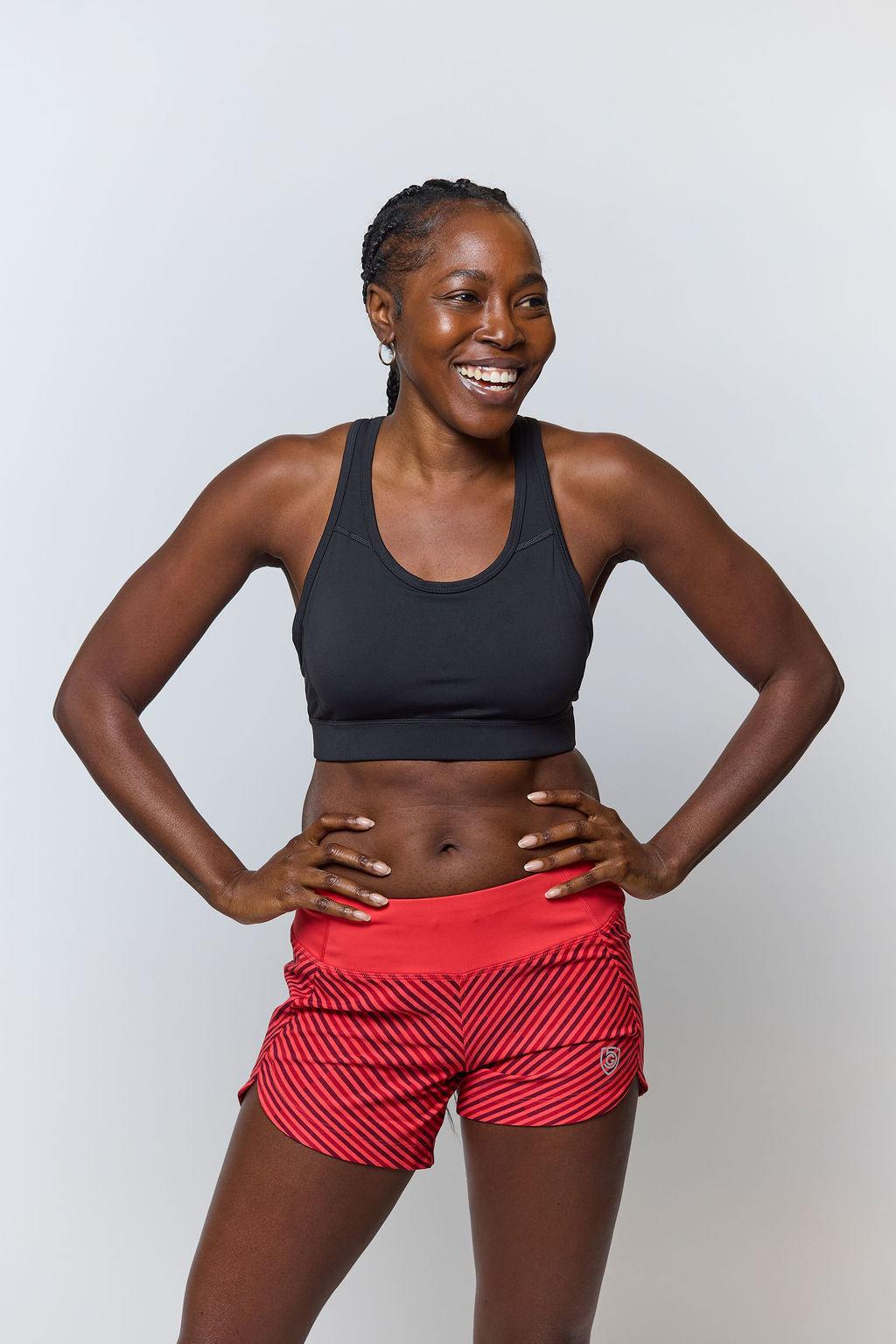 99'er Padded Sports Bra in black with a smooth stretch fabric, scoop neckline and wide supportive underband