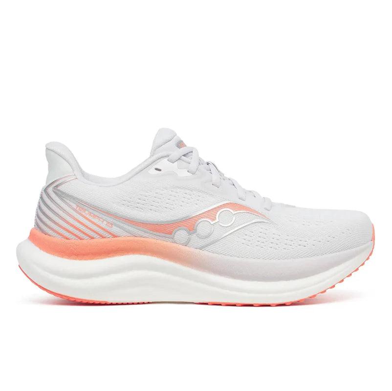 Saucony Women's Triumph 23 running shoe in white knit mesh with peach accents and a thick cushioned sole