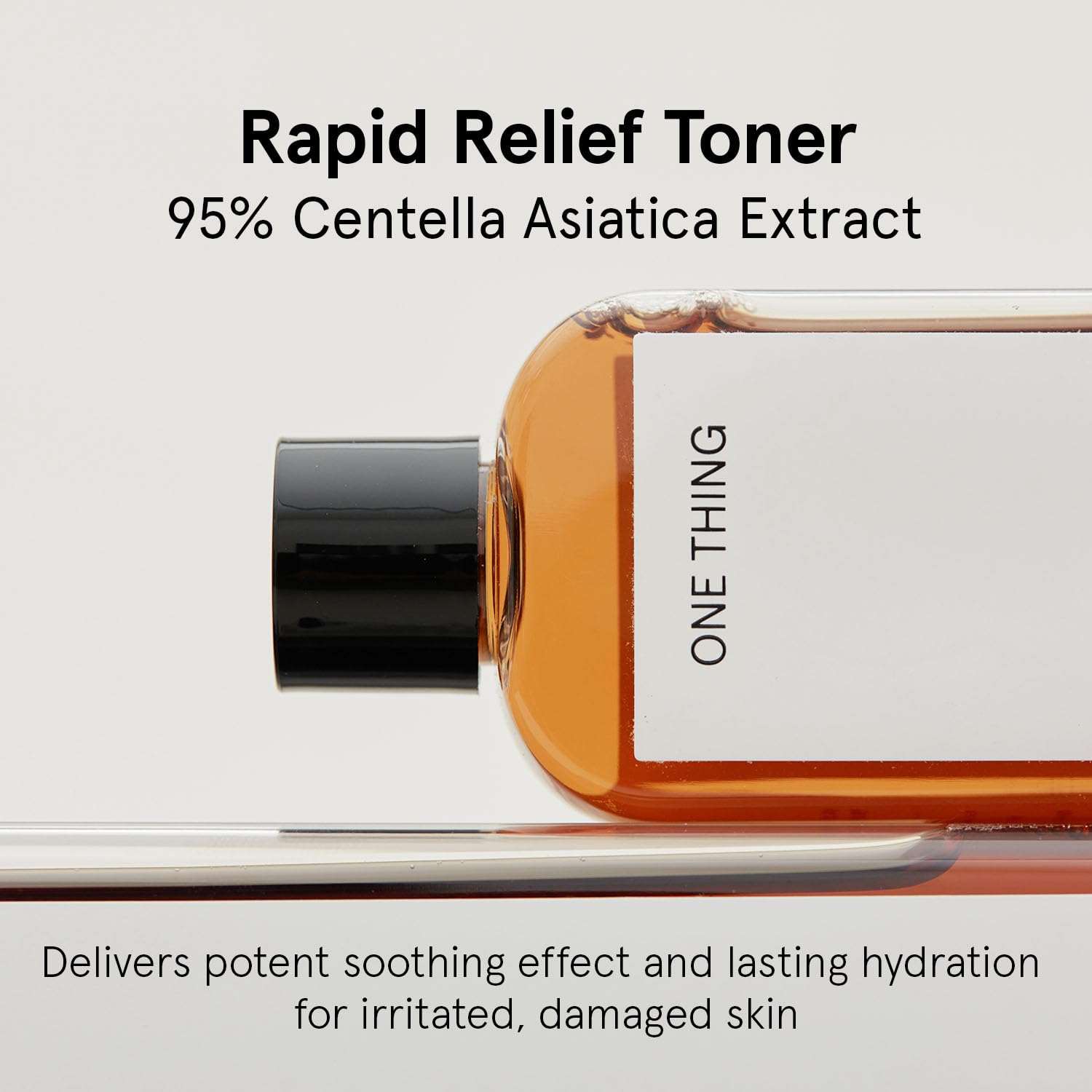 Asiatica Extract Toner in a clear amber bottle with black cap, labeled One Thing for soothing skin hydration