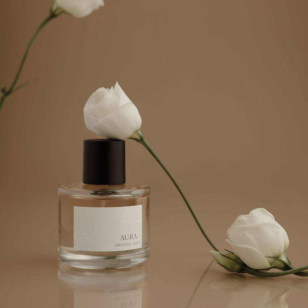 AURA non-toxic perfume bottle with grapefruit and tonka bean scent