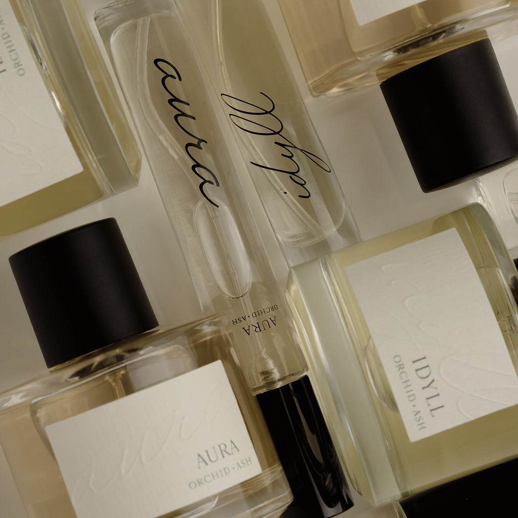 AURA Perfume Travel Spray with grapefruit and tonka bean scent