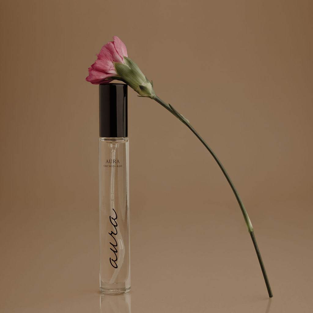 AURA Perfume Travel Spray with grapefruit and tonka bean fragrance
