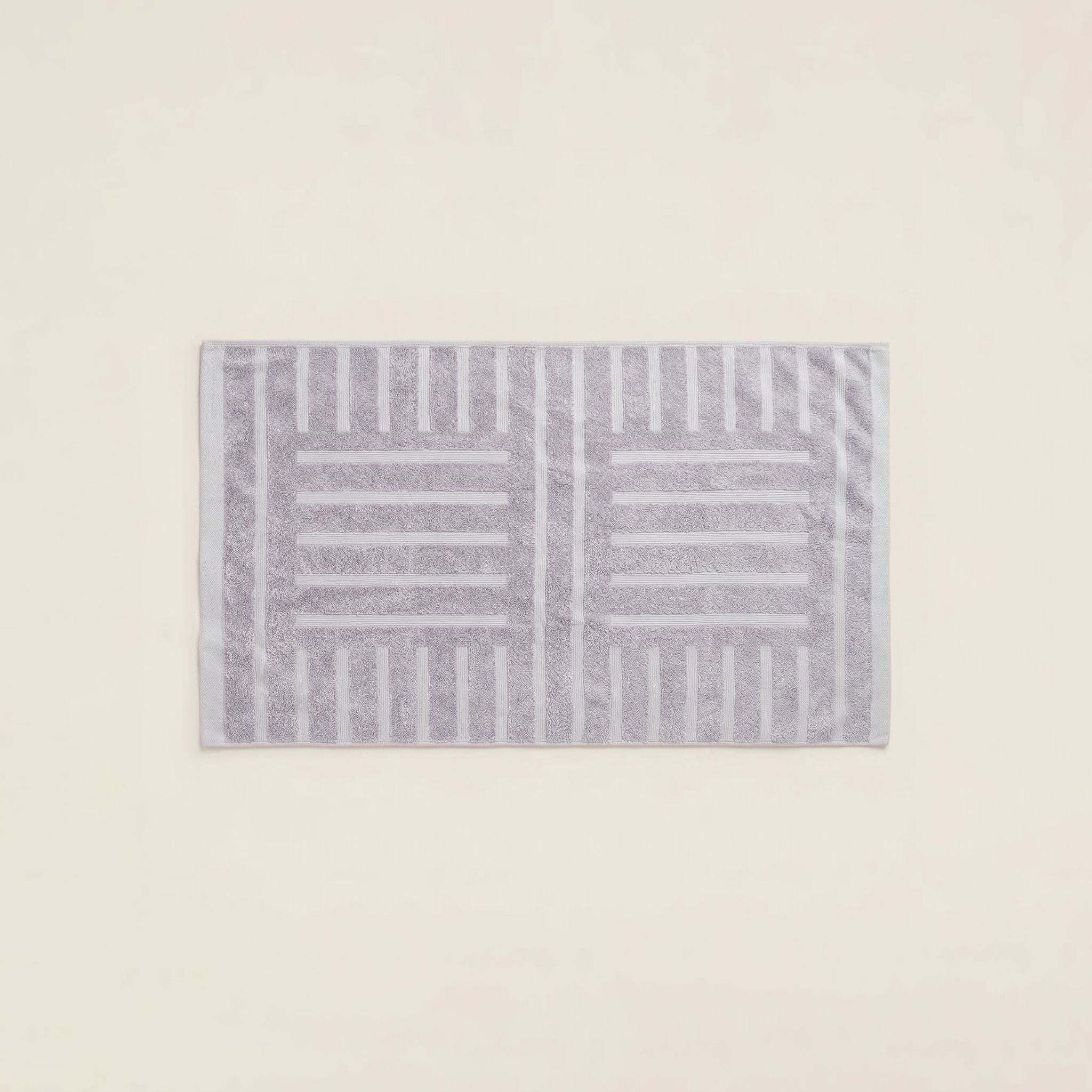 Lilac Australian Cotton towels with geometric pattern, dense 600 GSM cotton featuring a soft texture and locker loop