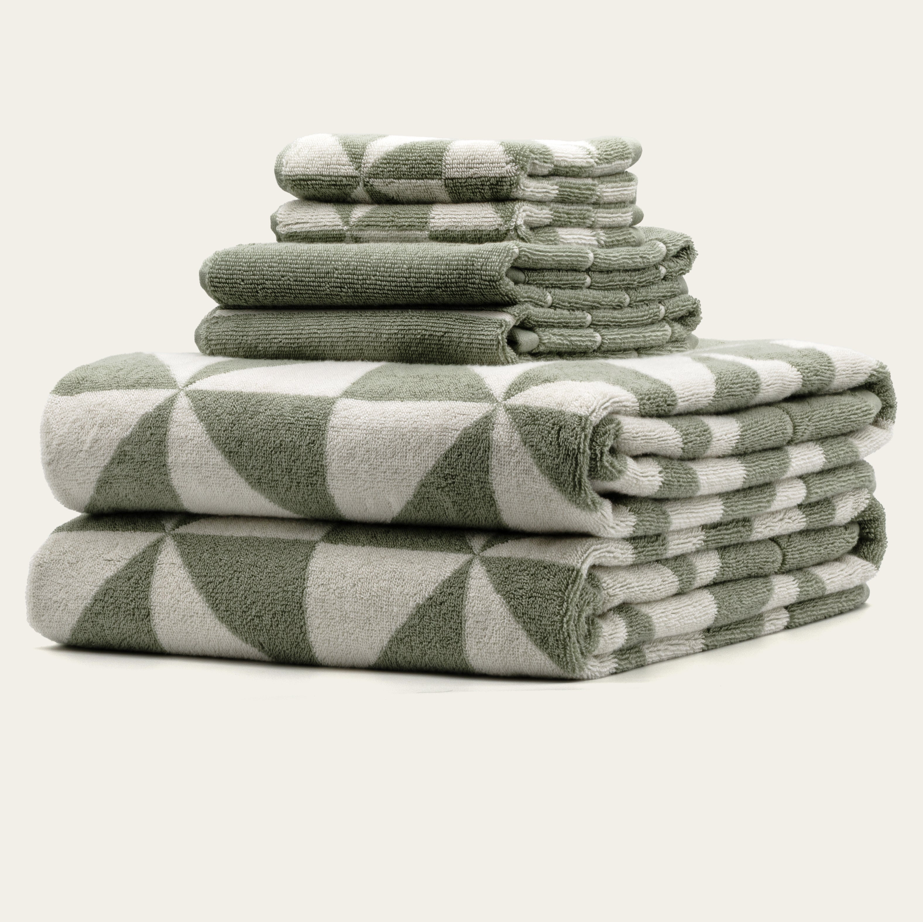 Australian Cotton Towels in sage green and ivory, plush cotton with a bold geometric diamond pattern