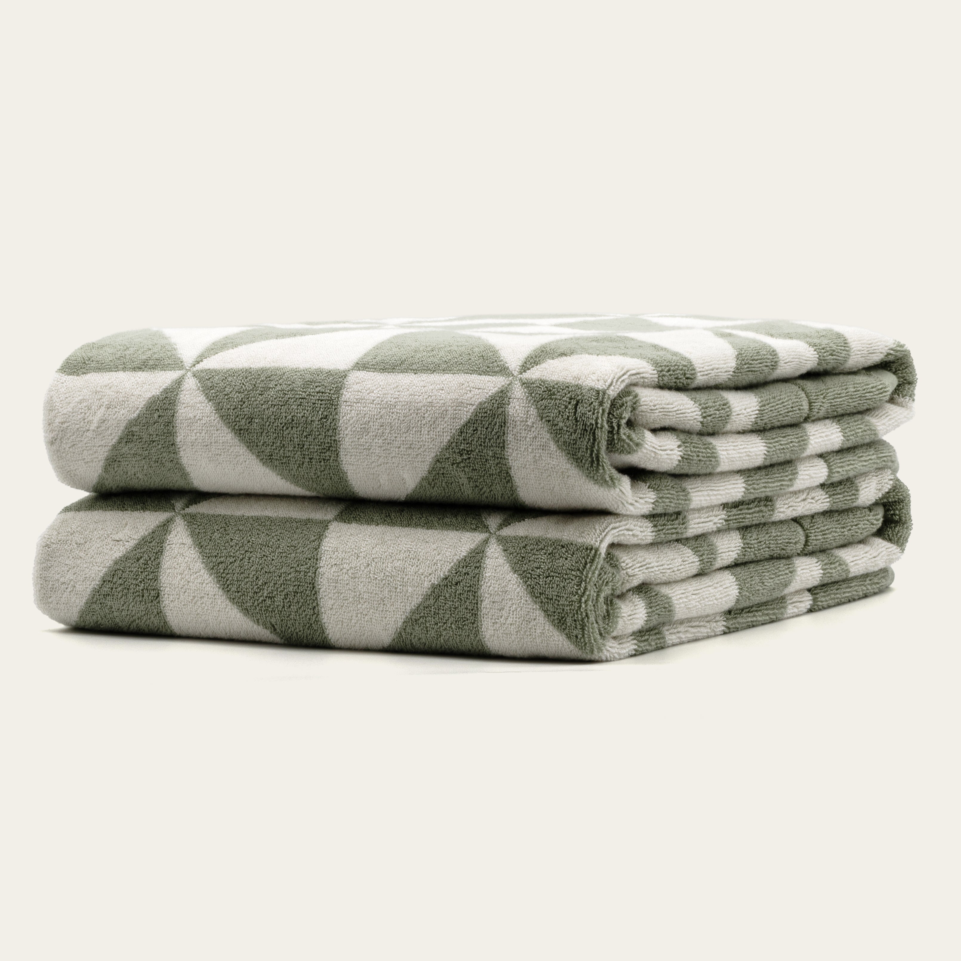 Australian Cotton Towels in muted sage and ivory, plush cotton with a bold geometric triangular pattern