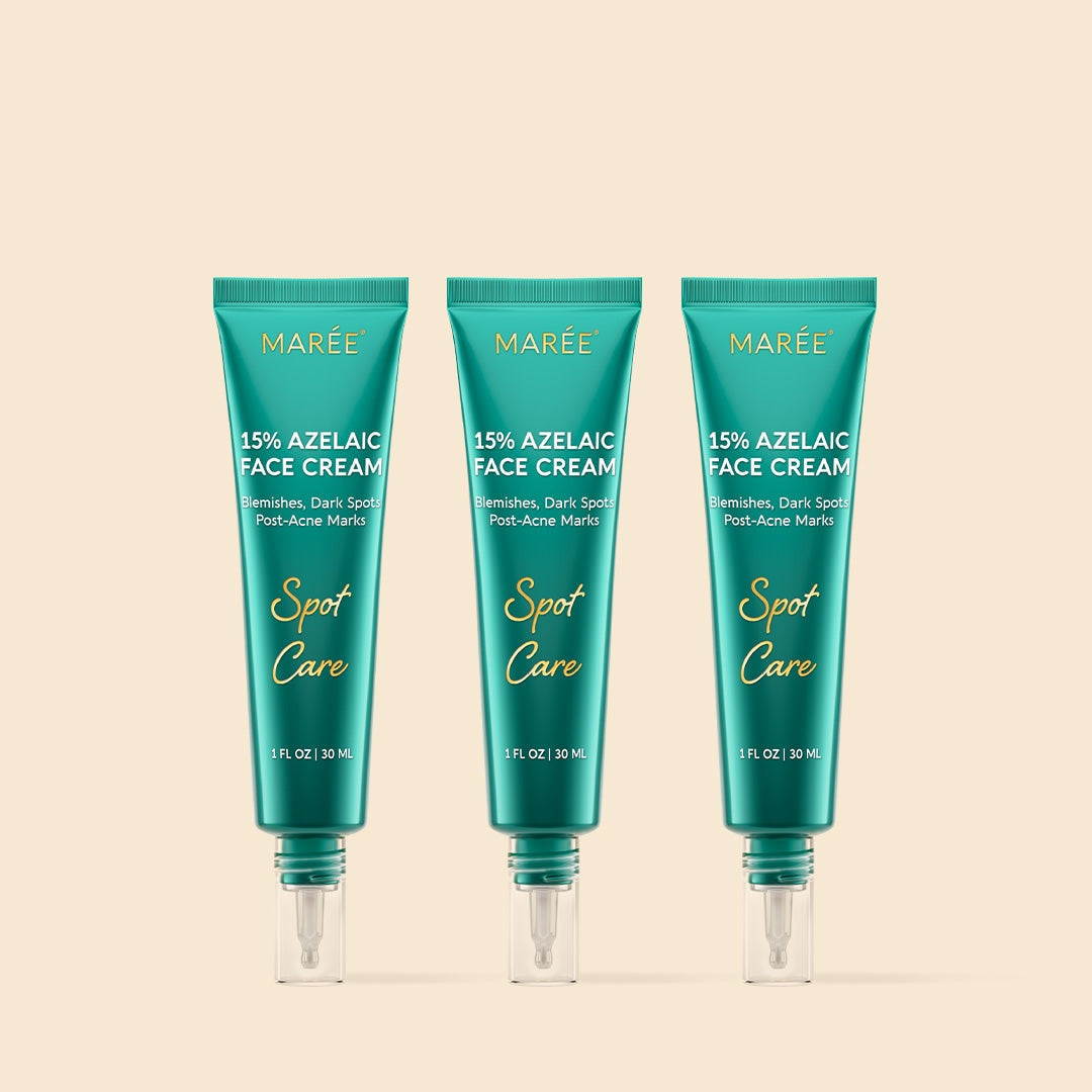 Azelaic Acid Cream in three teal 15% face cream tubes with yellow lettering and clear applicator tips