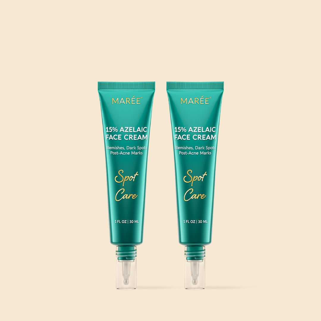 Azelaic Acid Cream in two teal tubes with gold lettering and clear precision applicator tips