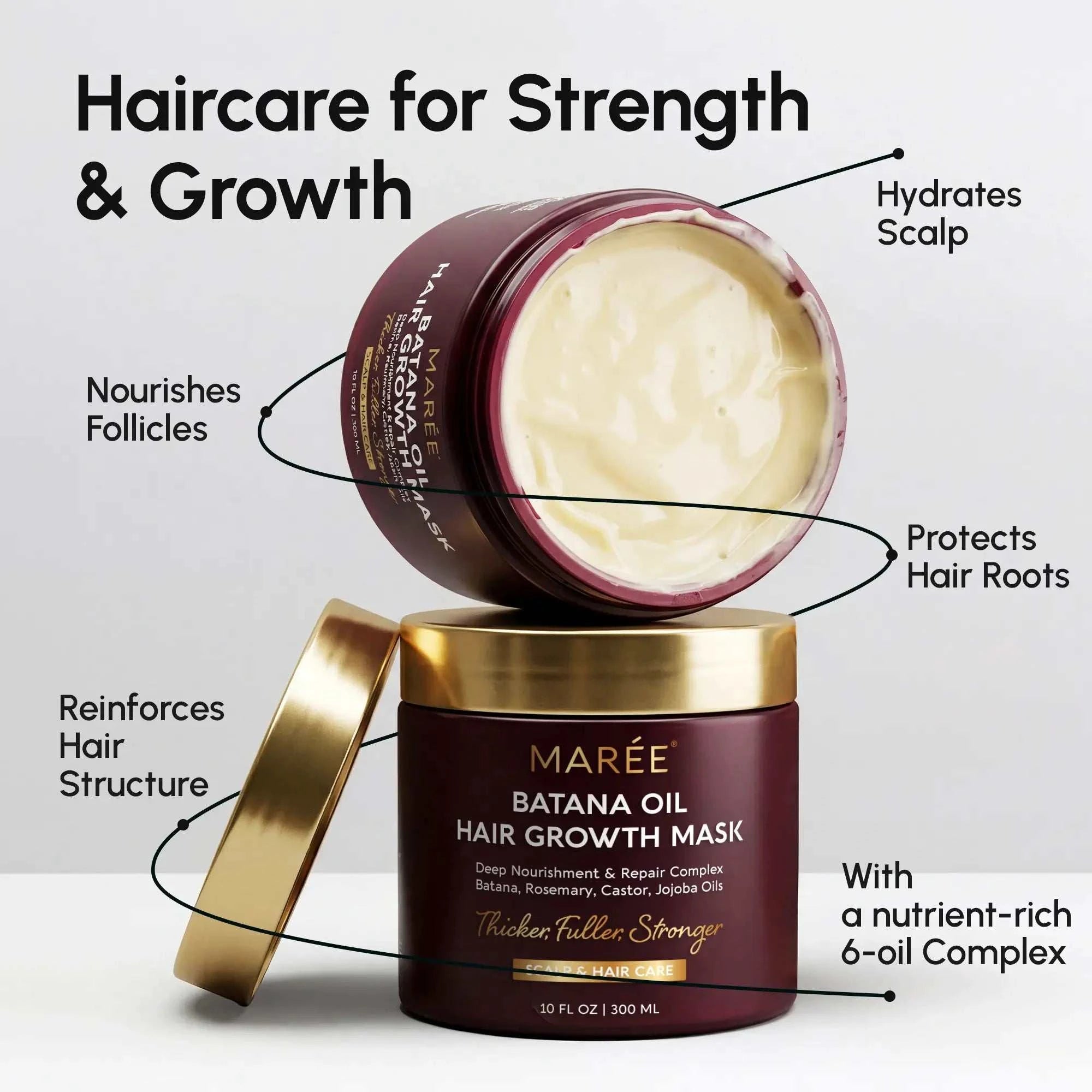 Batana Hair Growth Mask in burgundy jars with gold lids, showing a creamy ivory mask and batana oil haircare label