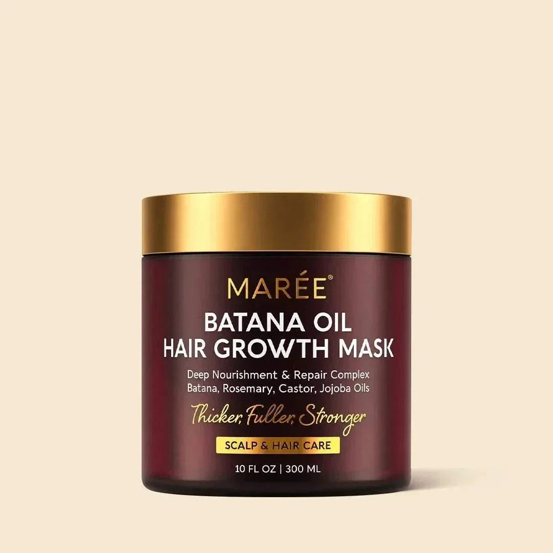Batana Hair Growth Mask in a burgundy jar with a gold lid, labeled with batana oil and botanical oils.