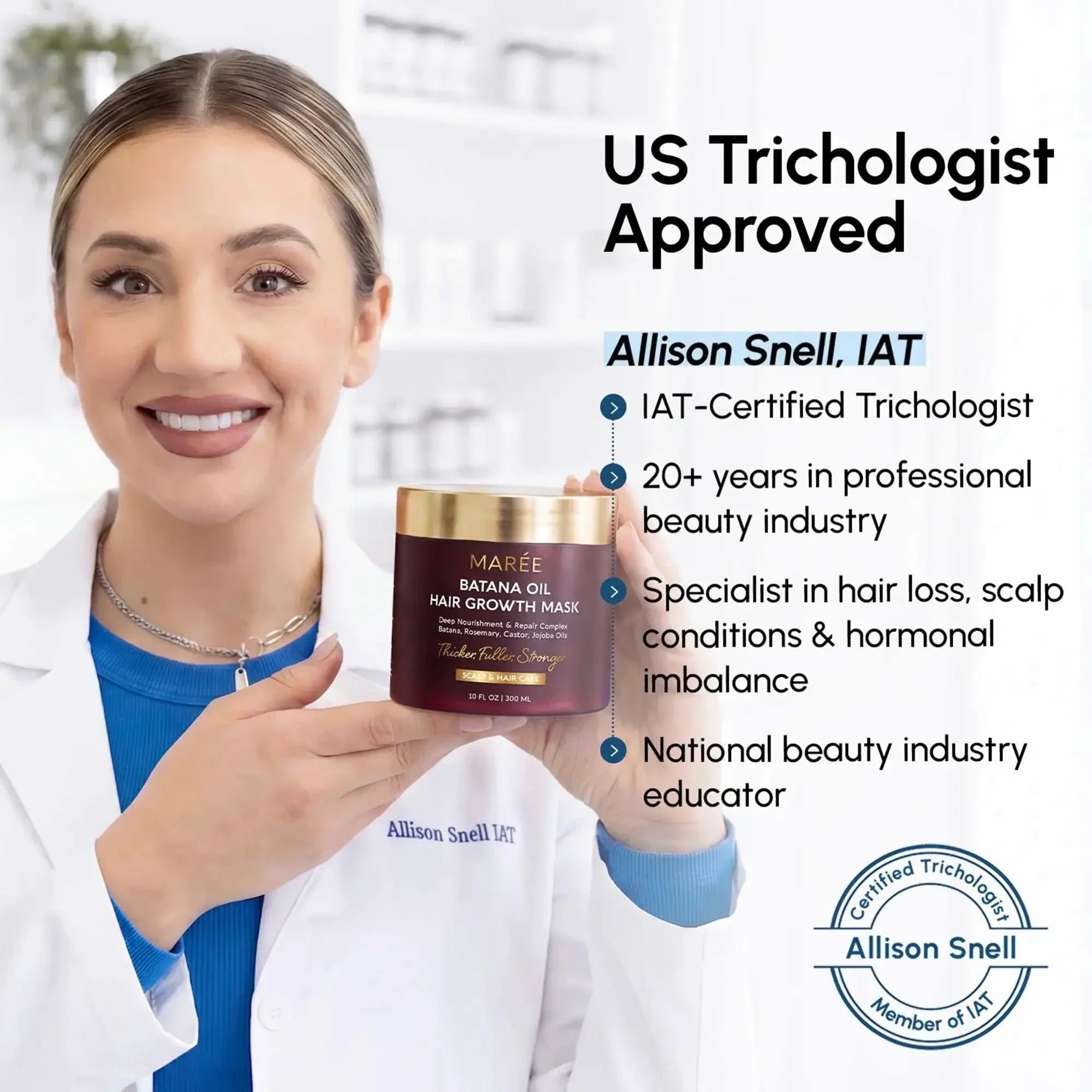 Batana Hair Growth Mask in a burgundy jar with a gold lid, held by a trichologist in a white coat