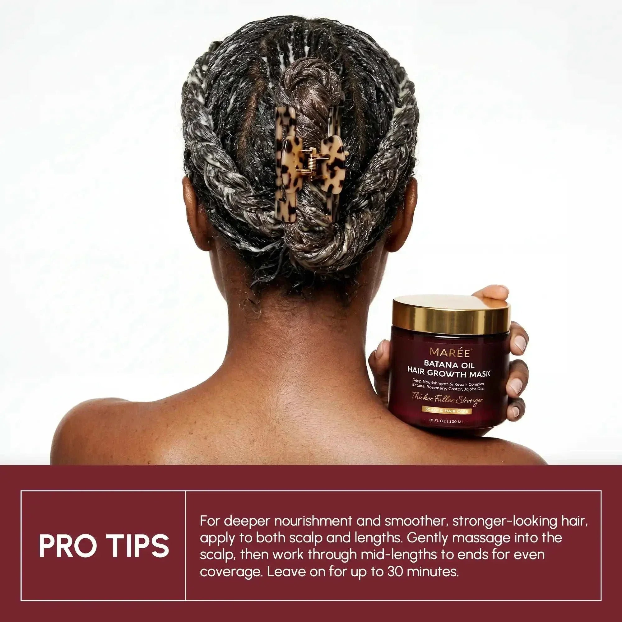 Batana Hair Growth Mask in a burgundy jar with a gold lid, shown beside hair coated in a dark treatment