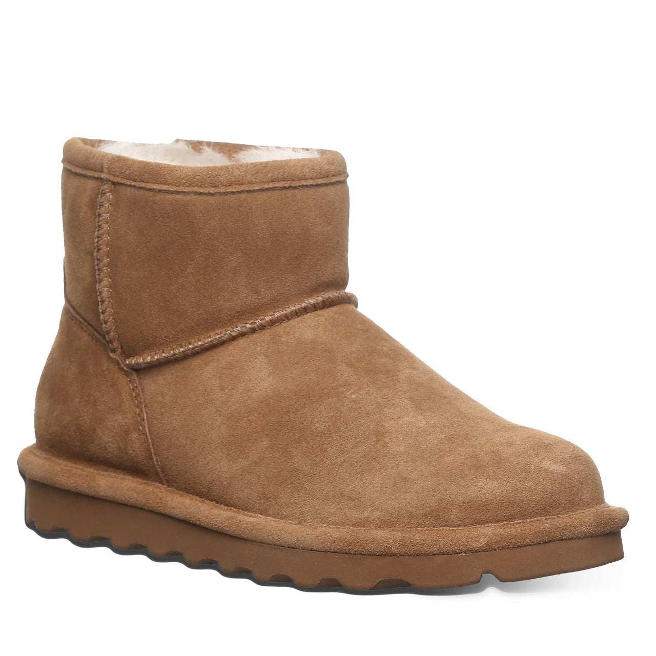 Bearpaw Women's Alyssa Boot in tan suede, featuring a short ankle shaft, rolled cuff and dark rubber outsole