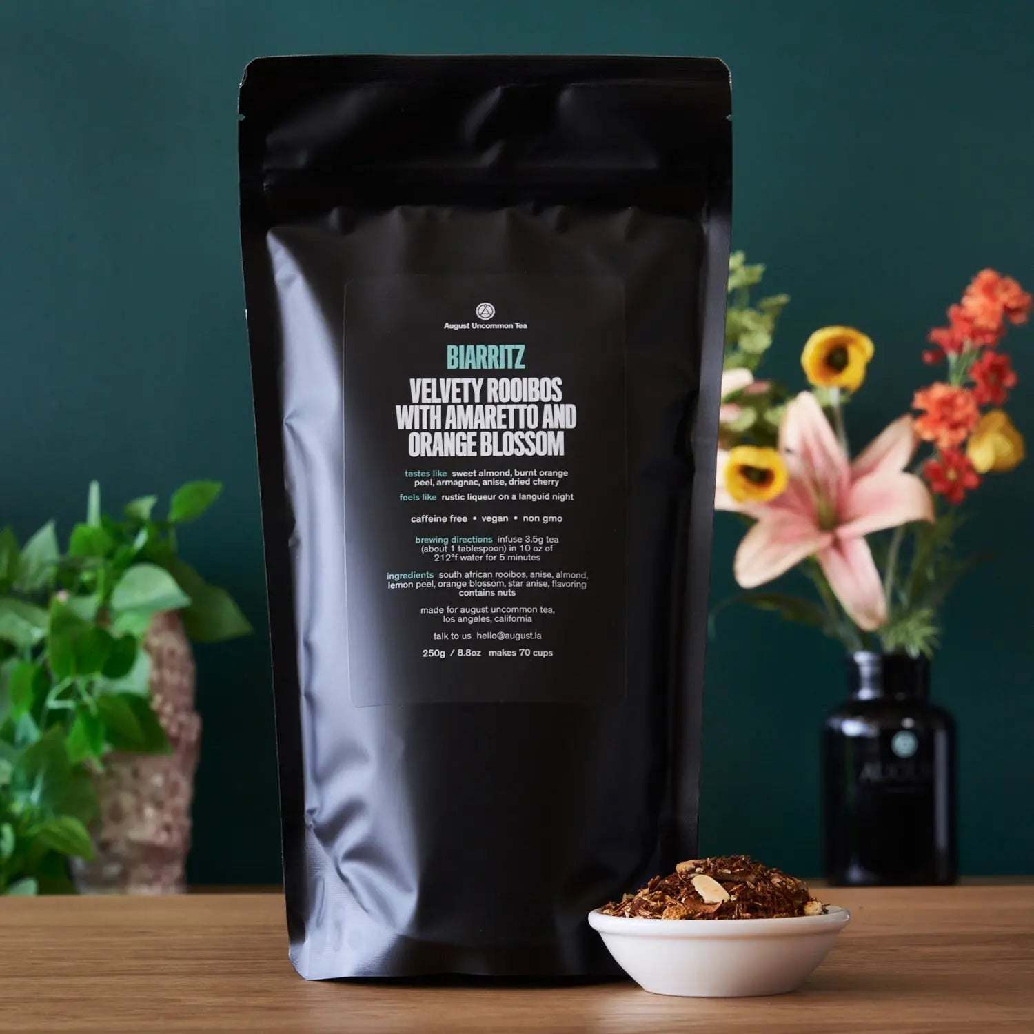 Biarritz - Orange Amaretto Rooibos Tea in a black resealable pouch with rooibos blend and almond pieces