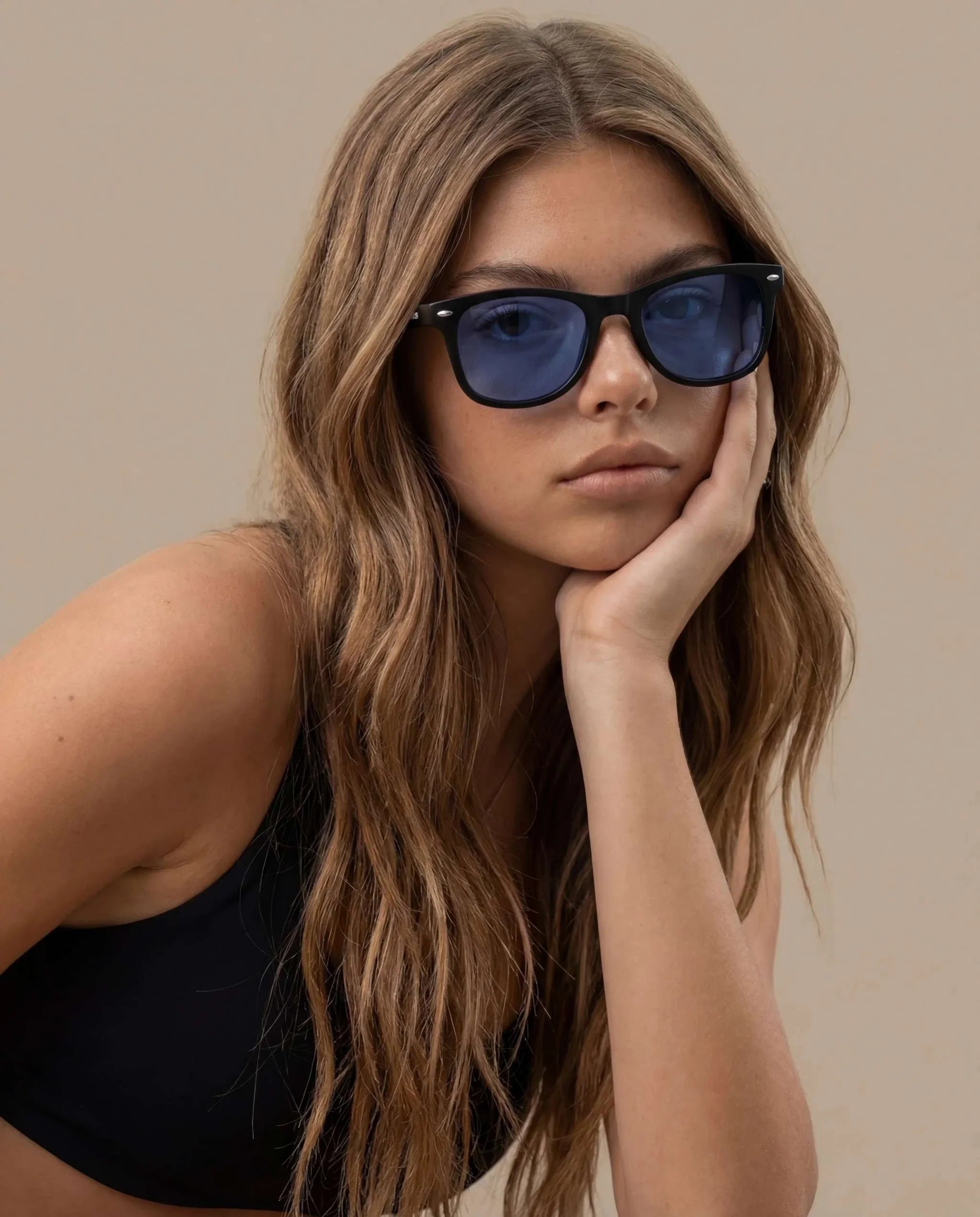Black Square Sport Sunglasses with a glossy black frame, blue-tinted lenses and a bold square shape