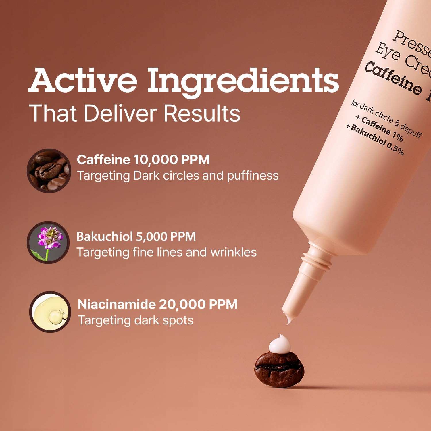 Blithe Pressed Eye Cream in a soft pink tube dispensing white cream onto a coffee bean, highlighting active ingredients.