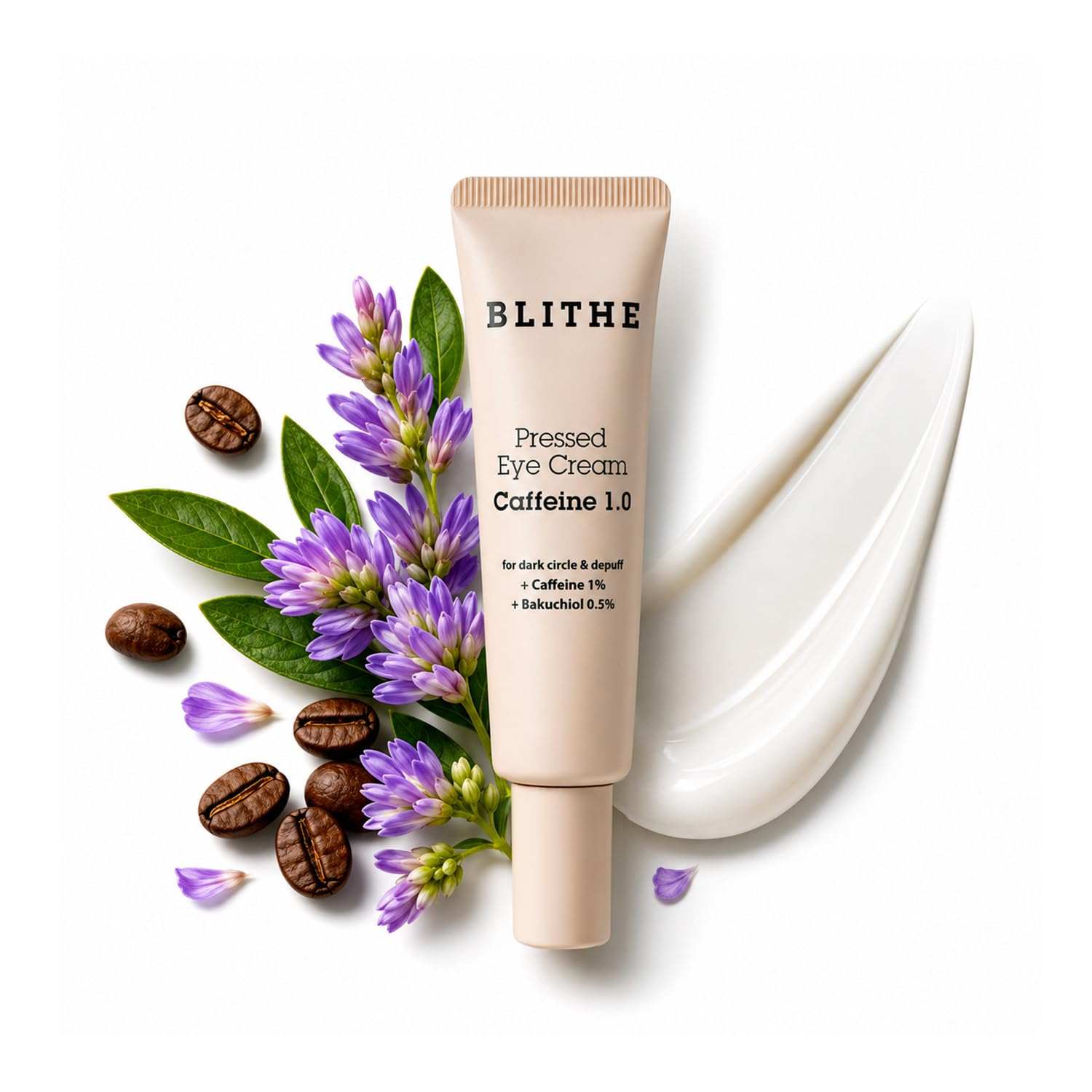Blithe Pressed Eye Cream in a beige tube with black text, surrounded by coffee beans, purple flowers, and a white cream smudge.