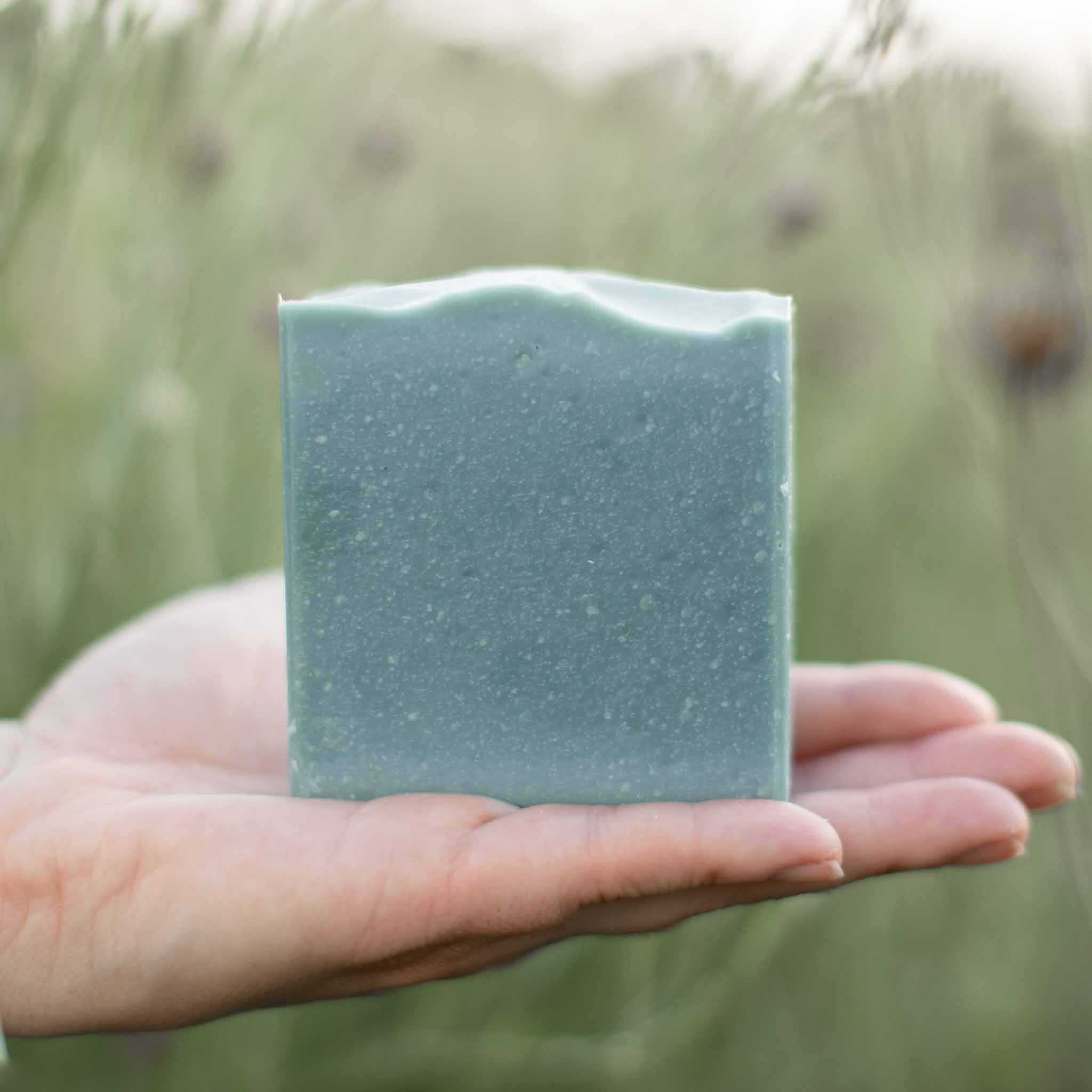 Blue Beauty Cream Facial Bar, blue-green rectangular facial soap with a smooth, speckled surface and wavy top edge
