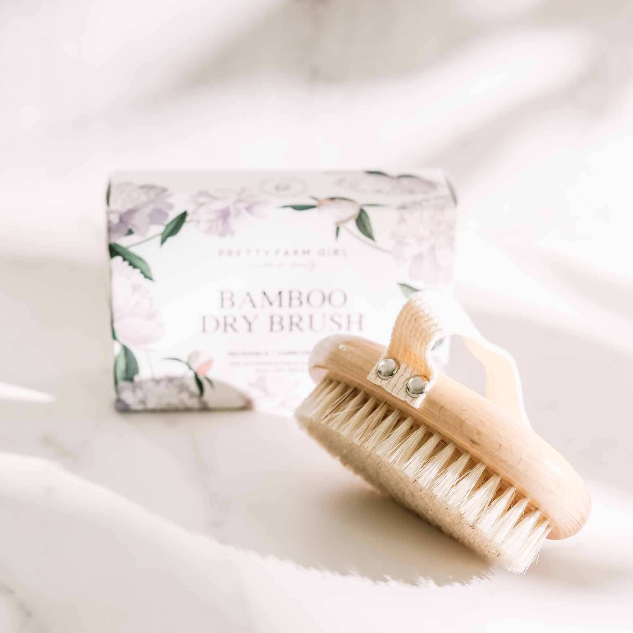 Body Care Lymphatic Routine Kit featuring a natural bamboo and sisal dry brush with floral packaging
