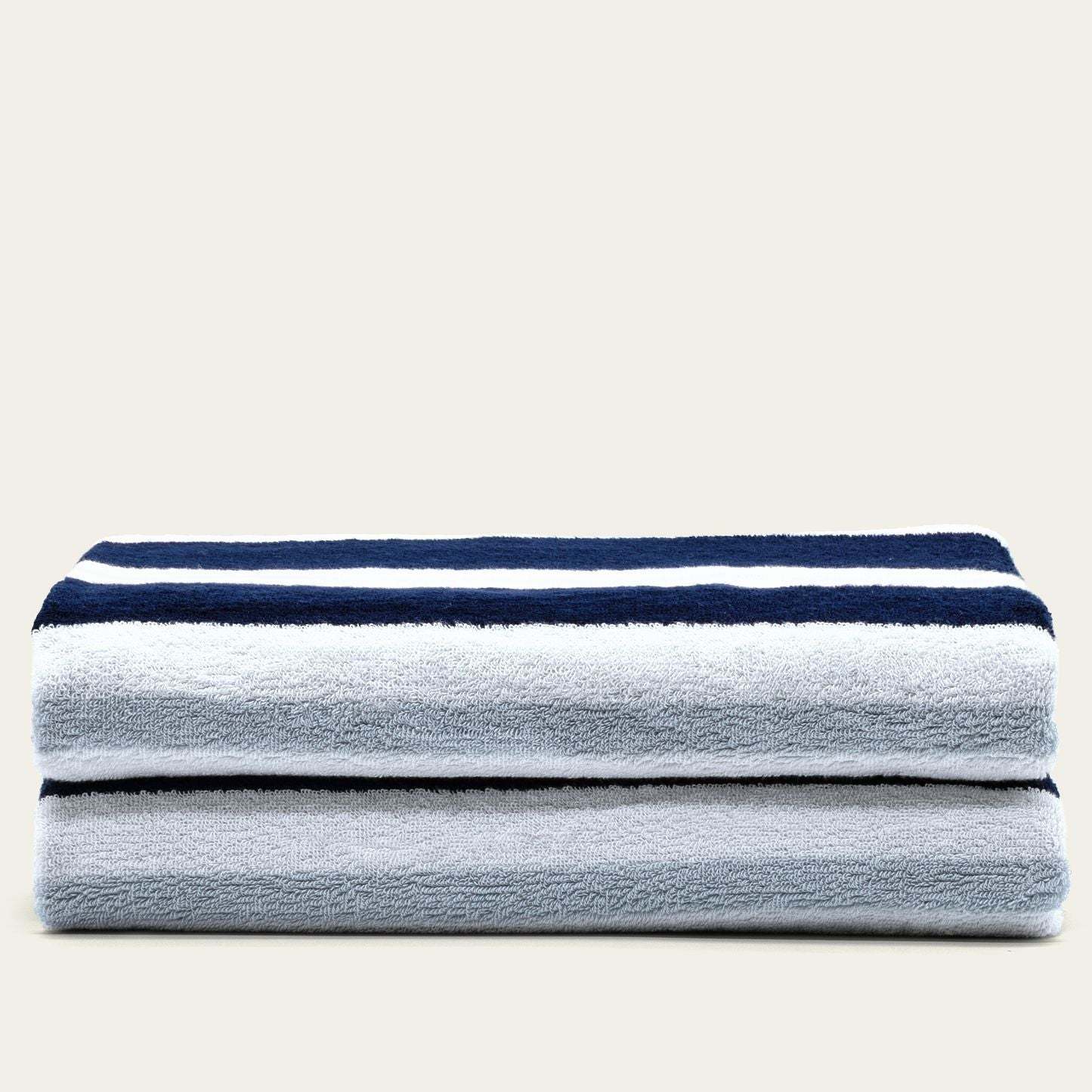 Bondi Australian Cotton beach towel in soft white and pale blue with bold navy stripes and plush terry texture
