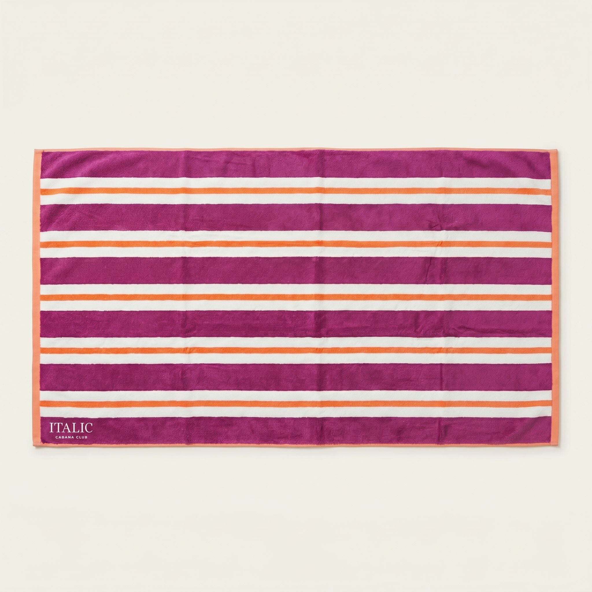 Bondi Australian Cotton beach towel in magenta with horizontal white and orange stripes and orange edging