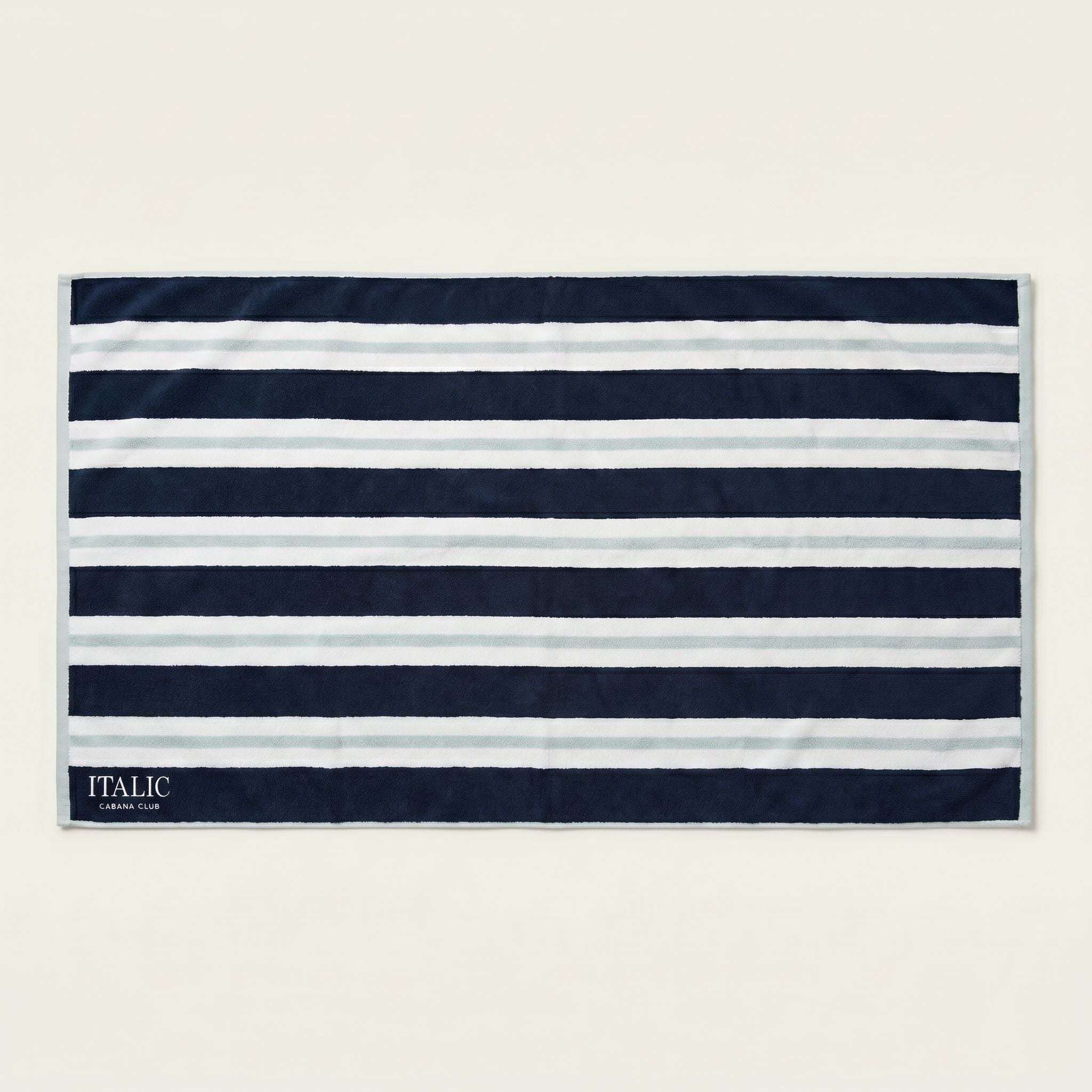 Bondi Australian Cotton beach towel in navy and white horizontal stripes, finished with a slim bound edge