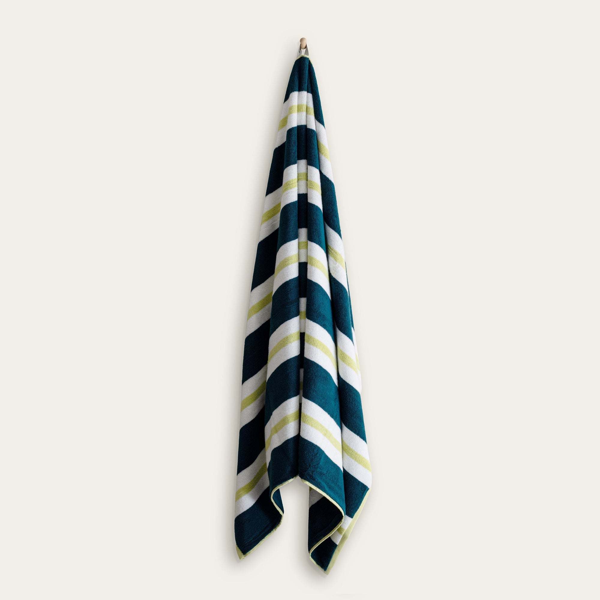 Bondi Australian Cotton beach towel in navy, teal, white and pale green with bold diagonal stripes and a plush finish
