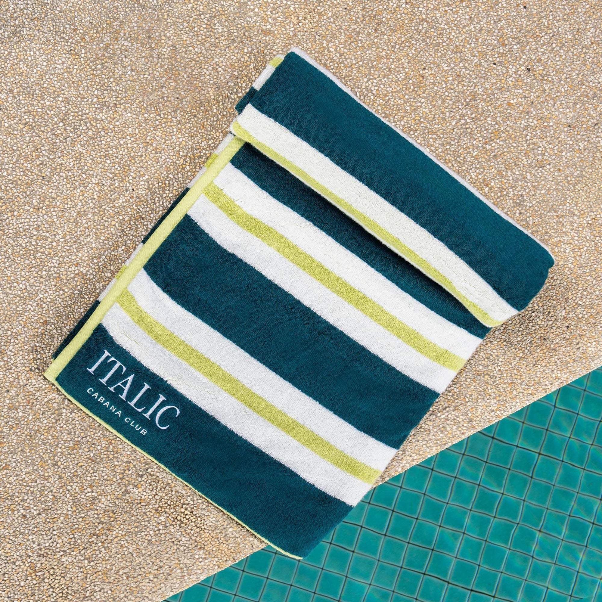 Bondi Australian Cotton beach towel with bold teal, white and pale lime stripes and a woven brand label