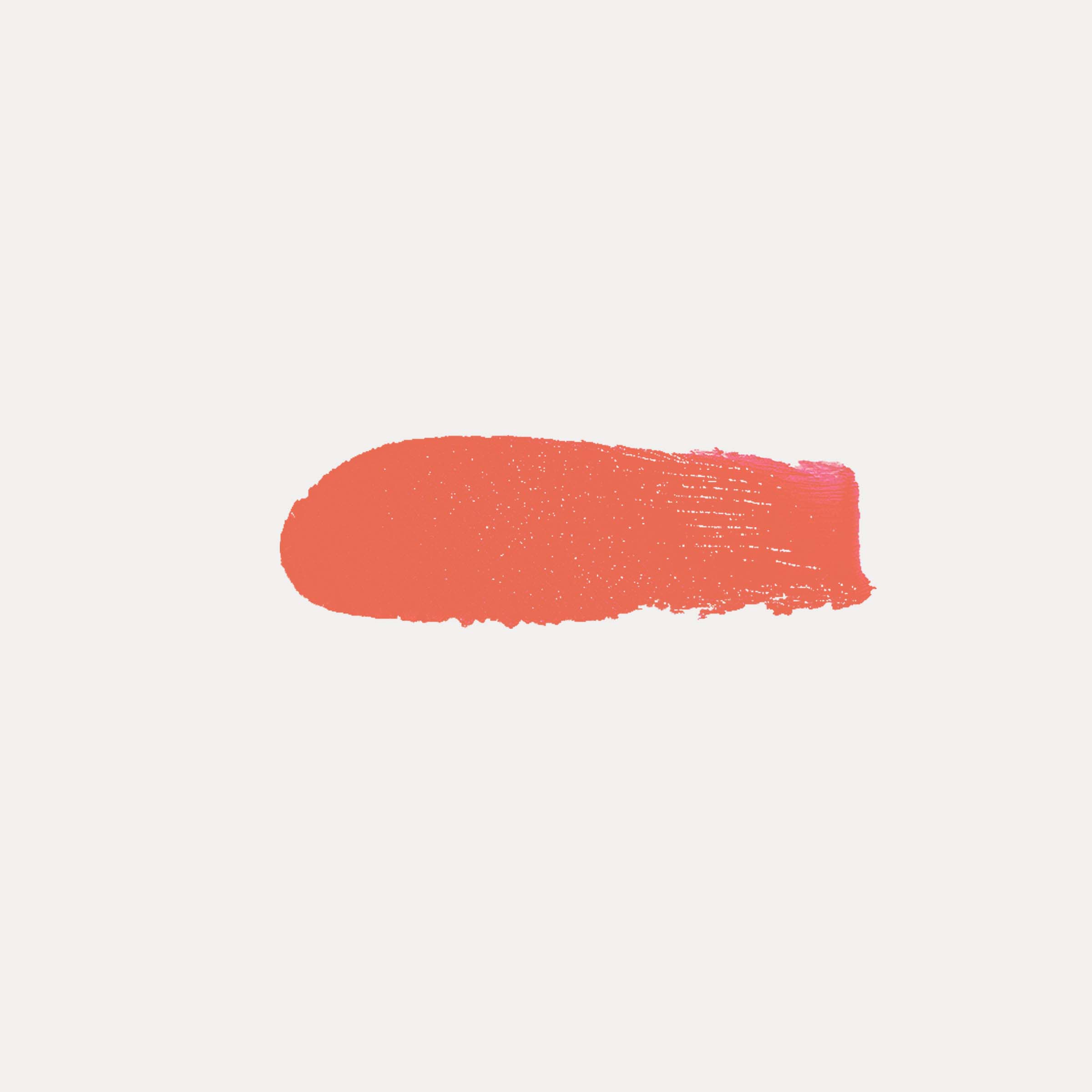 Buildable Cream Blush in a vibrant coral-orange shade, shown as a smooth creamy swatch with textured brush edges