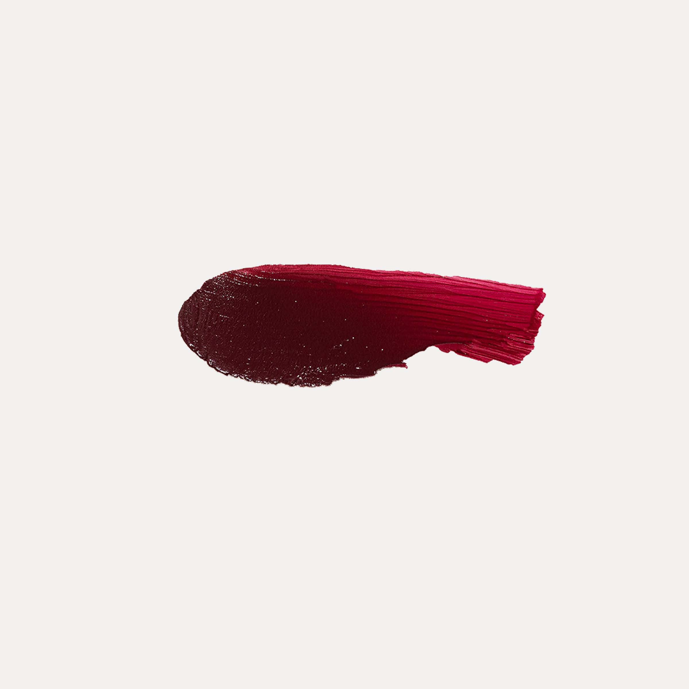 Buildable Cream Blush in a deep burgundy red, with a rich creamy texture and bold swatch finish