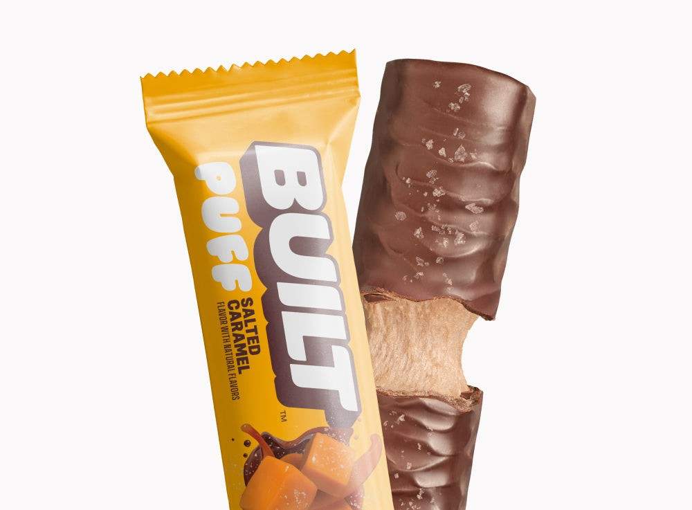Built puff salted caramel protein bar with chocolate coating and sea salt