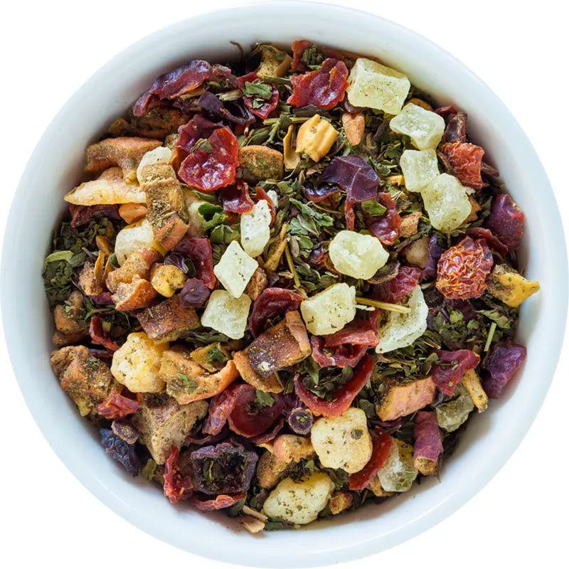 Capri - Honeydew Melon Mint Tea loose-leaf fruit tea with colorful dried fruit pieces, herbs and pale melon chunks