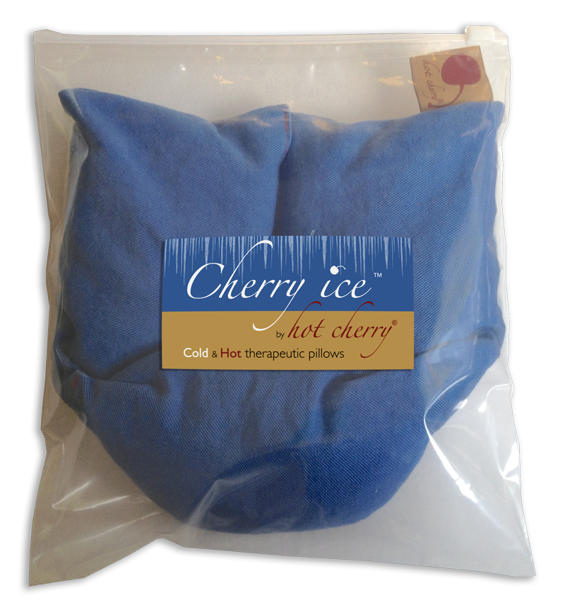 Cherry Ice® Blue Denim neck wrap in blue cotton denim, folded inside a clear zip-close freezer bag with a branded label