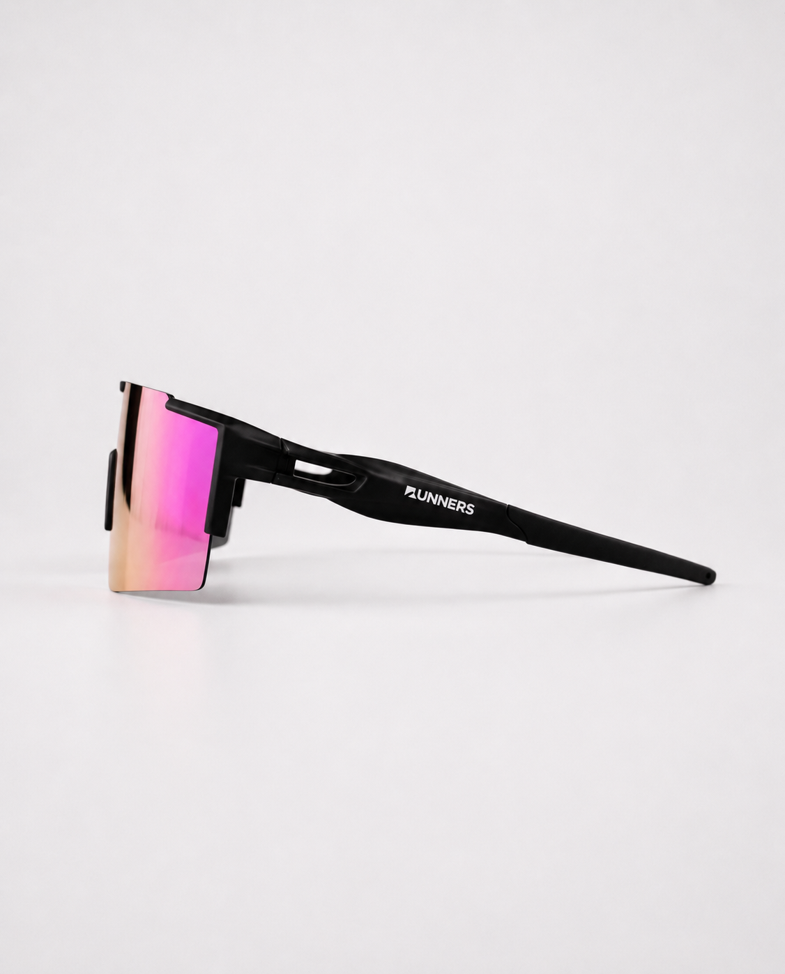 Cherry Pink Polarized Sunglasses with a frameless pink-to-orange mirrored lens, black temples and nose grip