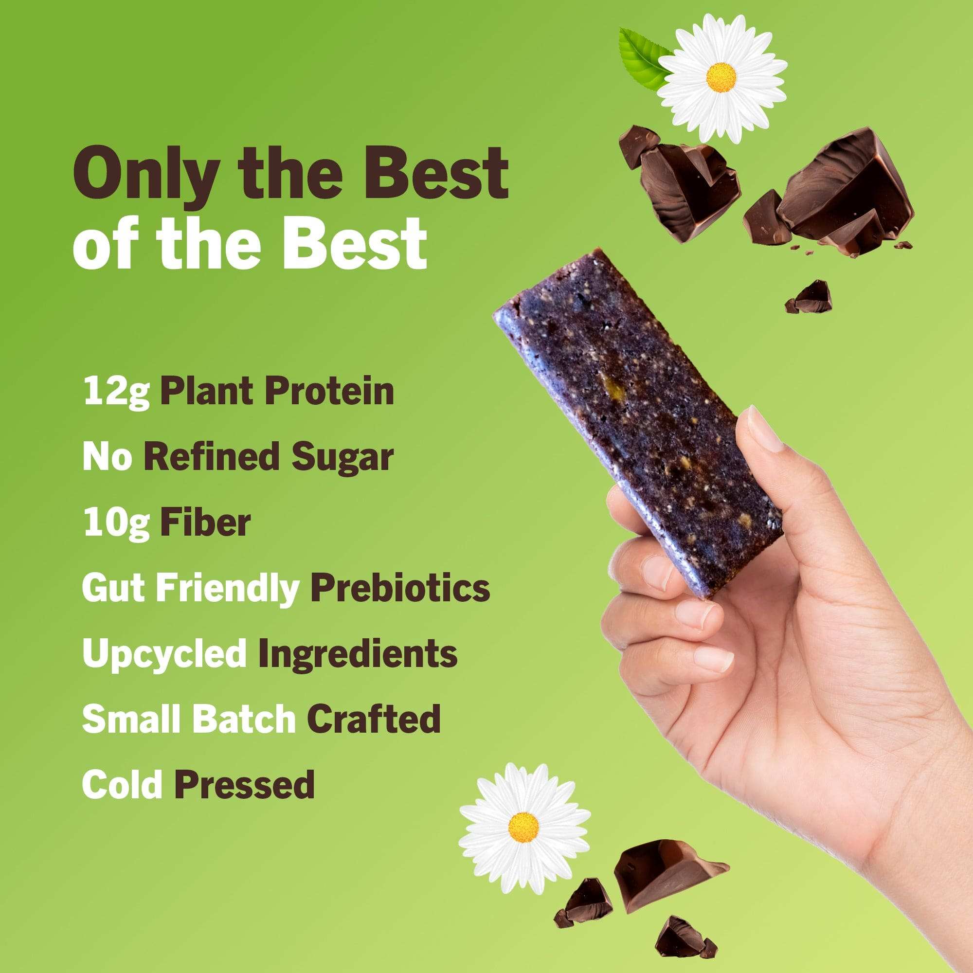 Chocolate Brownie protein bar, dark brown with a speckled texture and blue wrapper edges, held in a hand