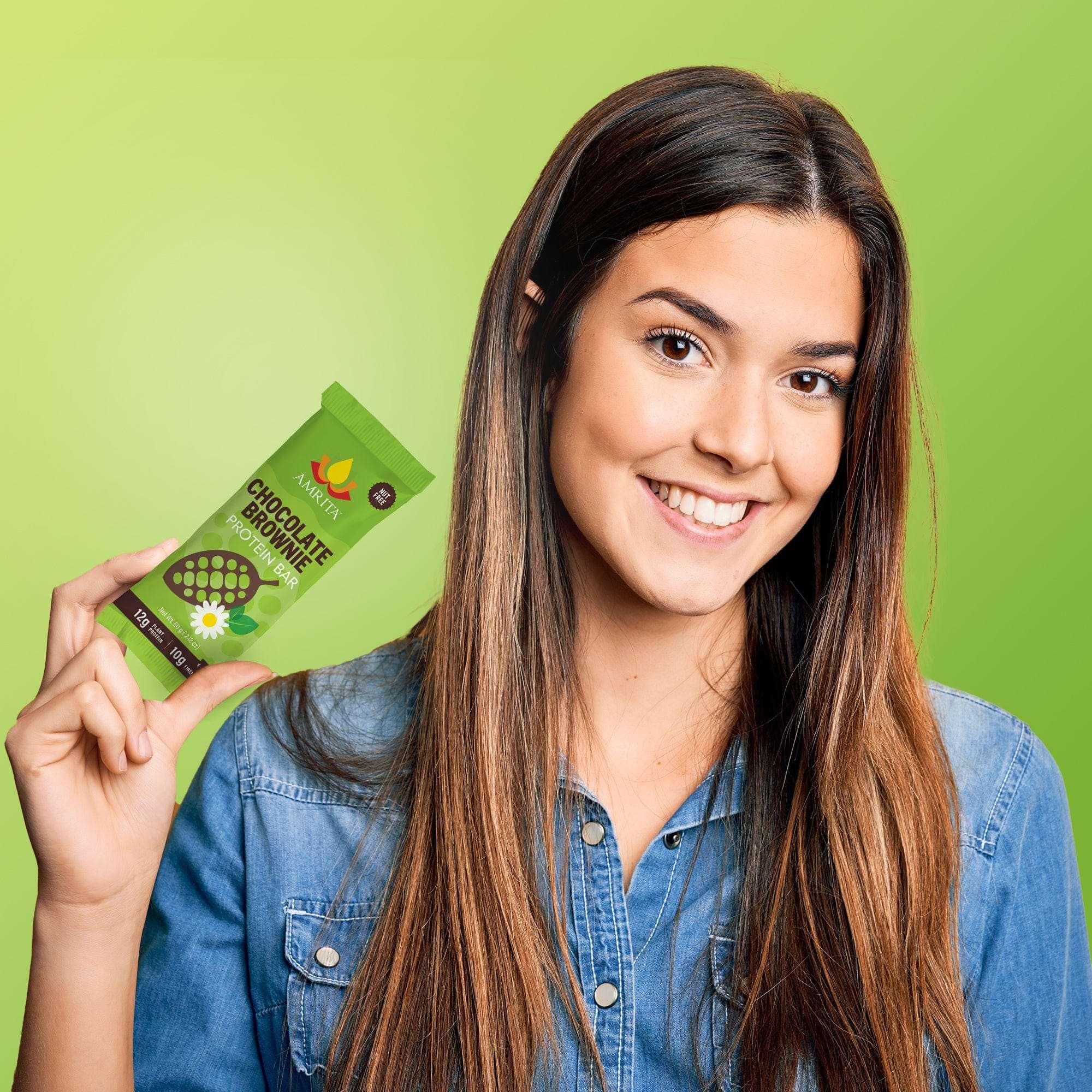 Chocolate Brownie protein bar in a bright green wrapper with white flower and dark cocoa-colored design