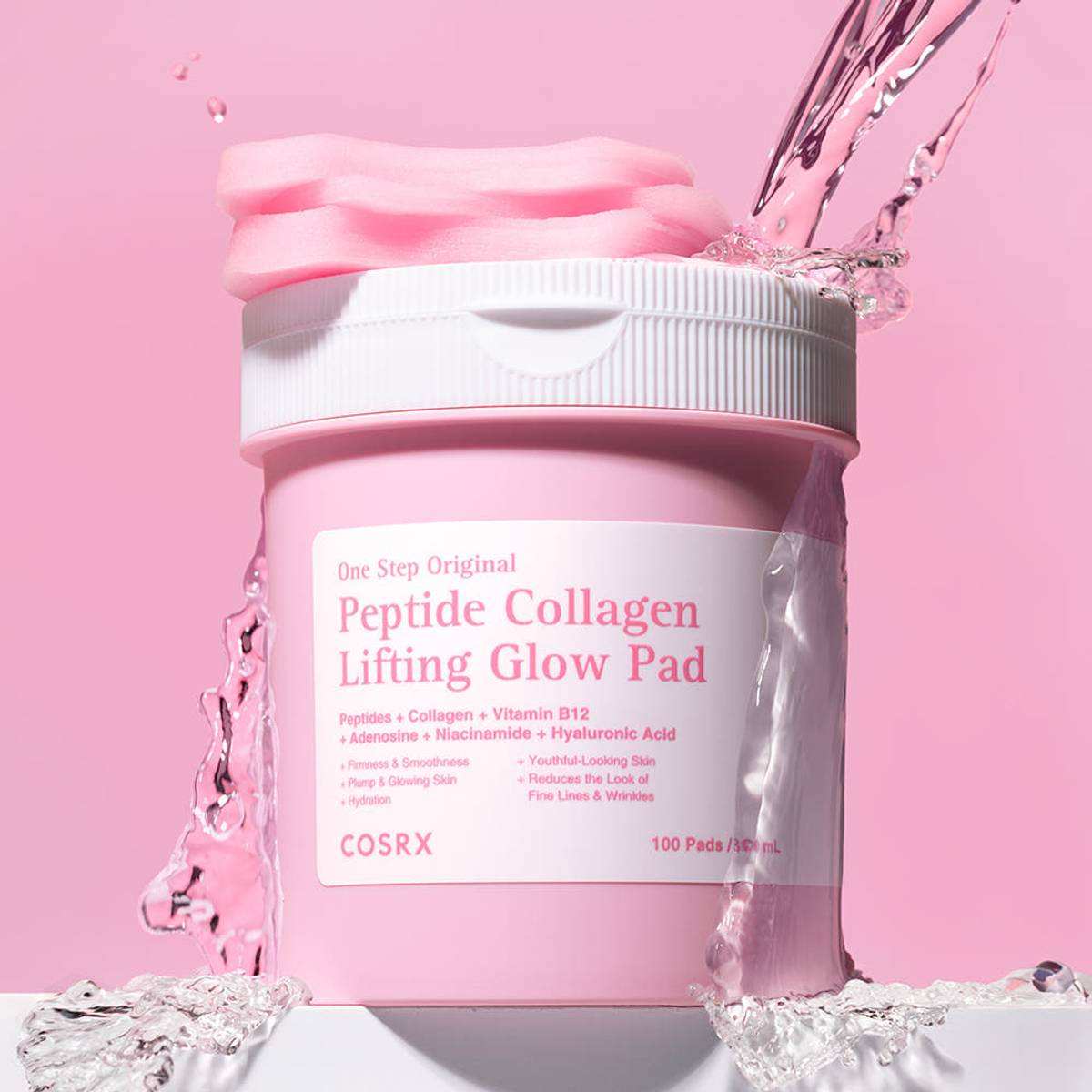 Skincare pad tub in a pink container with a white ribbed lid and Peptide Collagen Lifting Glow Pad label; COSRX Peptide Collagen Lifting Glow Pad, 100 pads.
