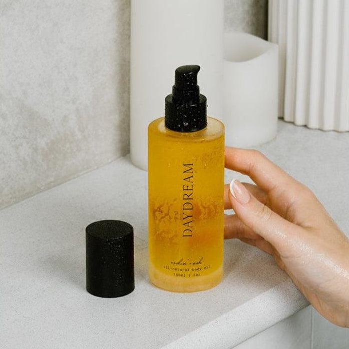 bottle of daydream all-natural orange neroli body oil