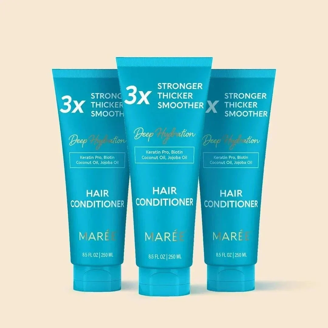 Bottle of deep hydrating coconut hair conditioner with natural oils and keratin