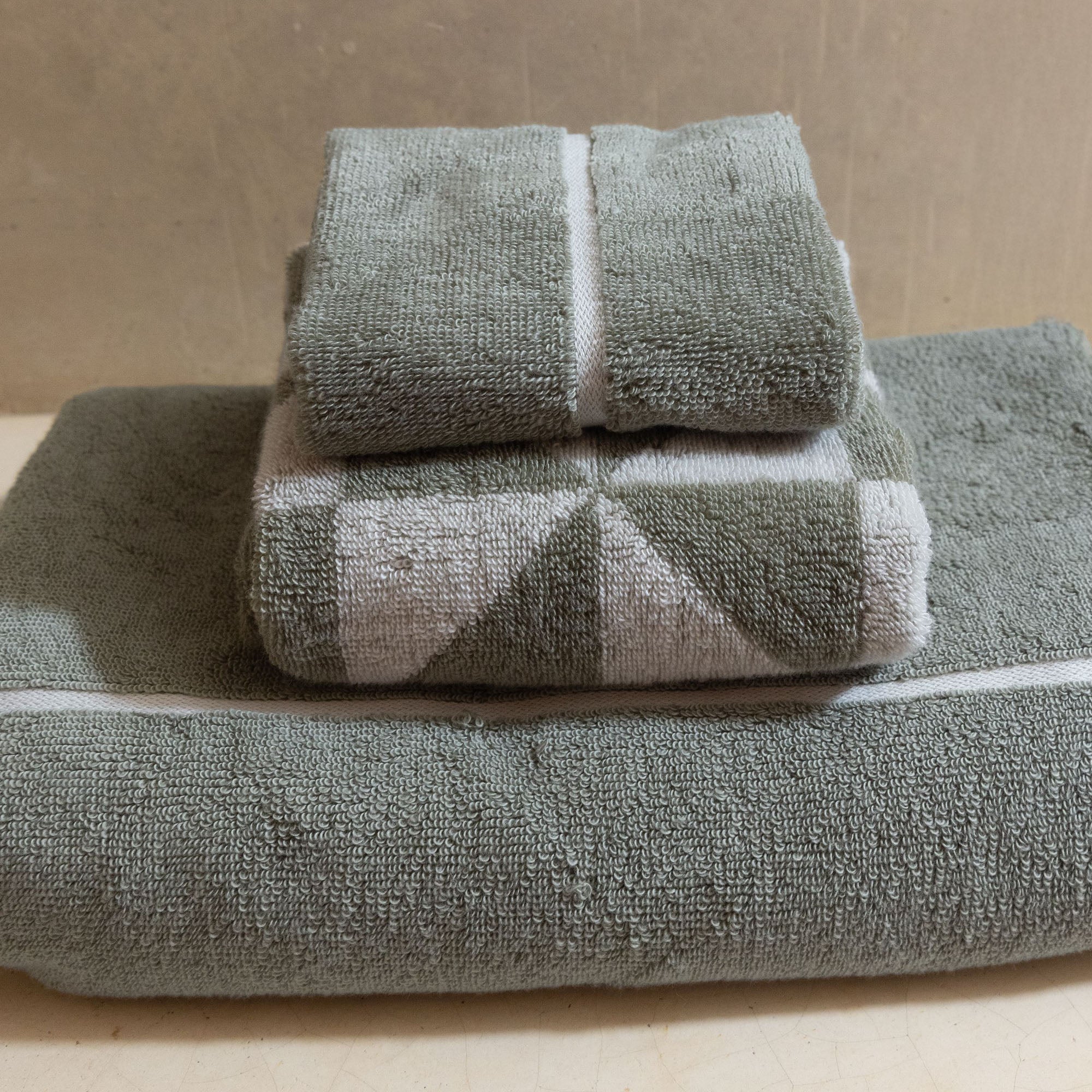 Deia Australian cotton towels set in white plush fabric