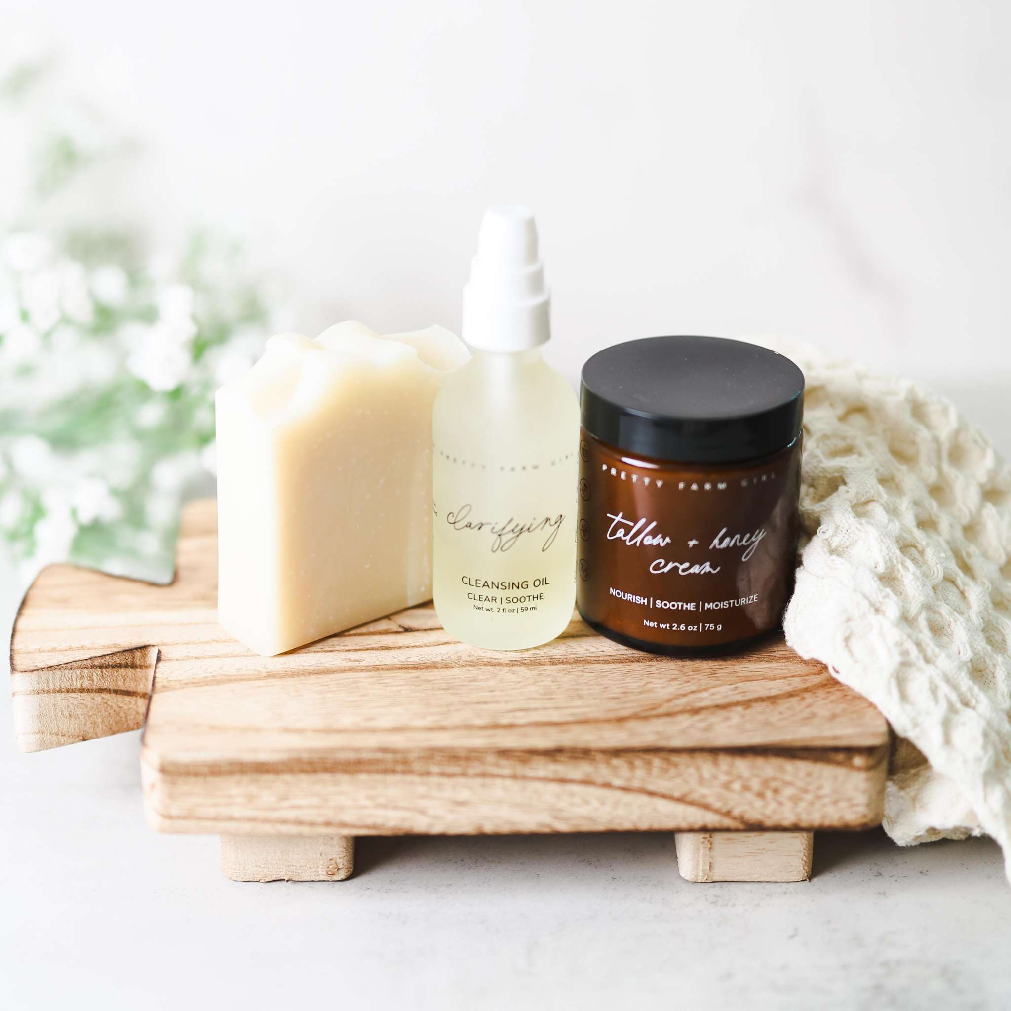 Double Cleansing Kit Soothing with cream soap bar, cleansing oil pump bottle, and tallow-honey cream jar