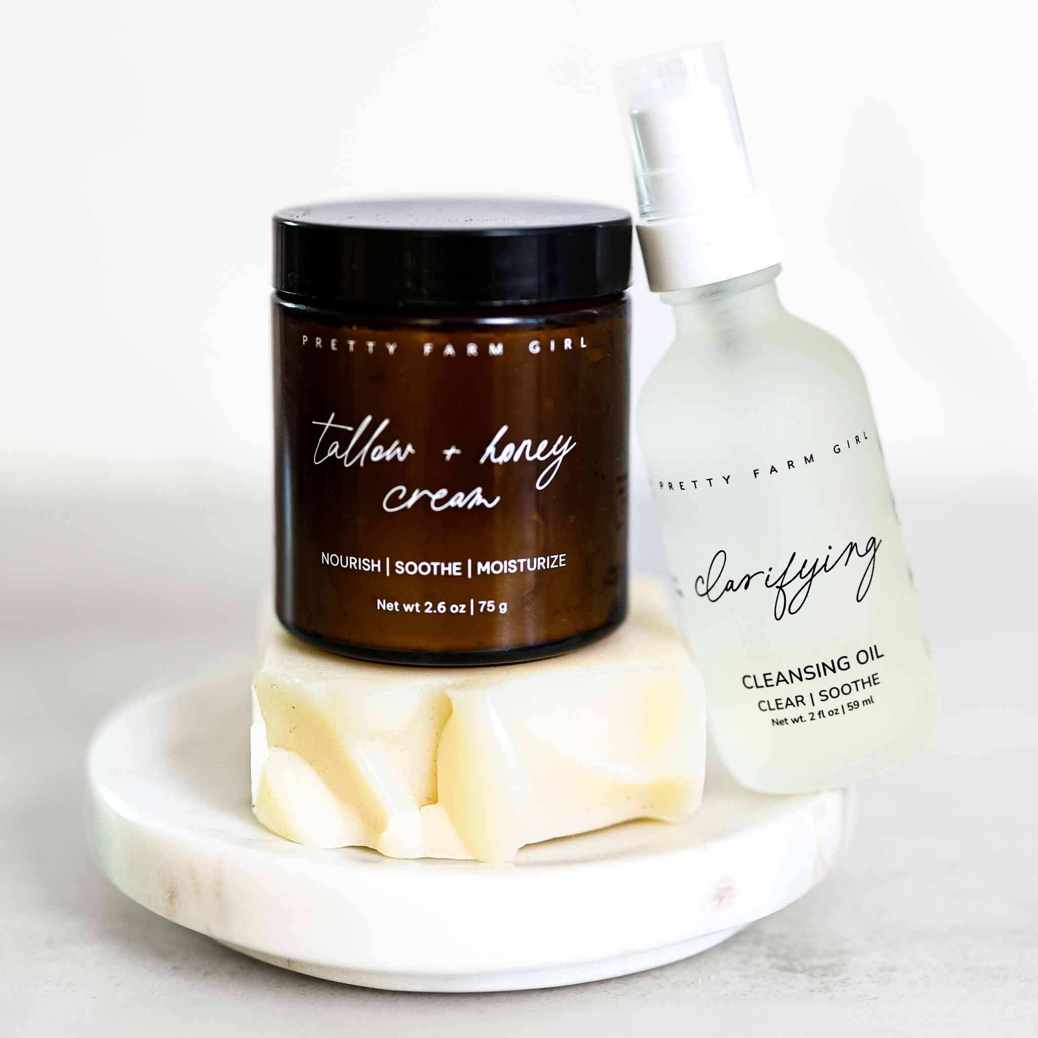 Double Cleansing Kit Soothing with amber tallow honey cream jar, cleansing oil bottle and white soap bar
