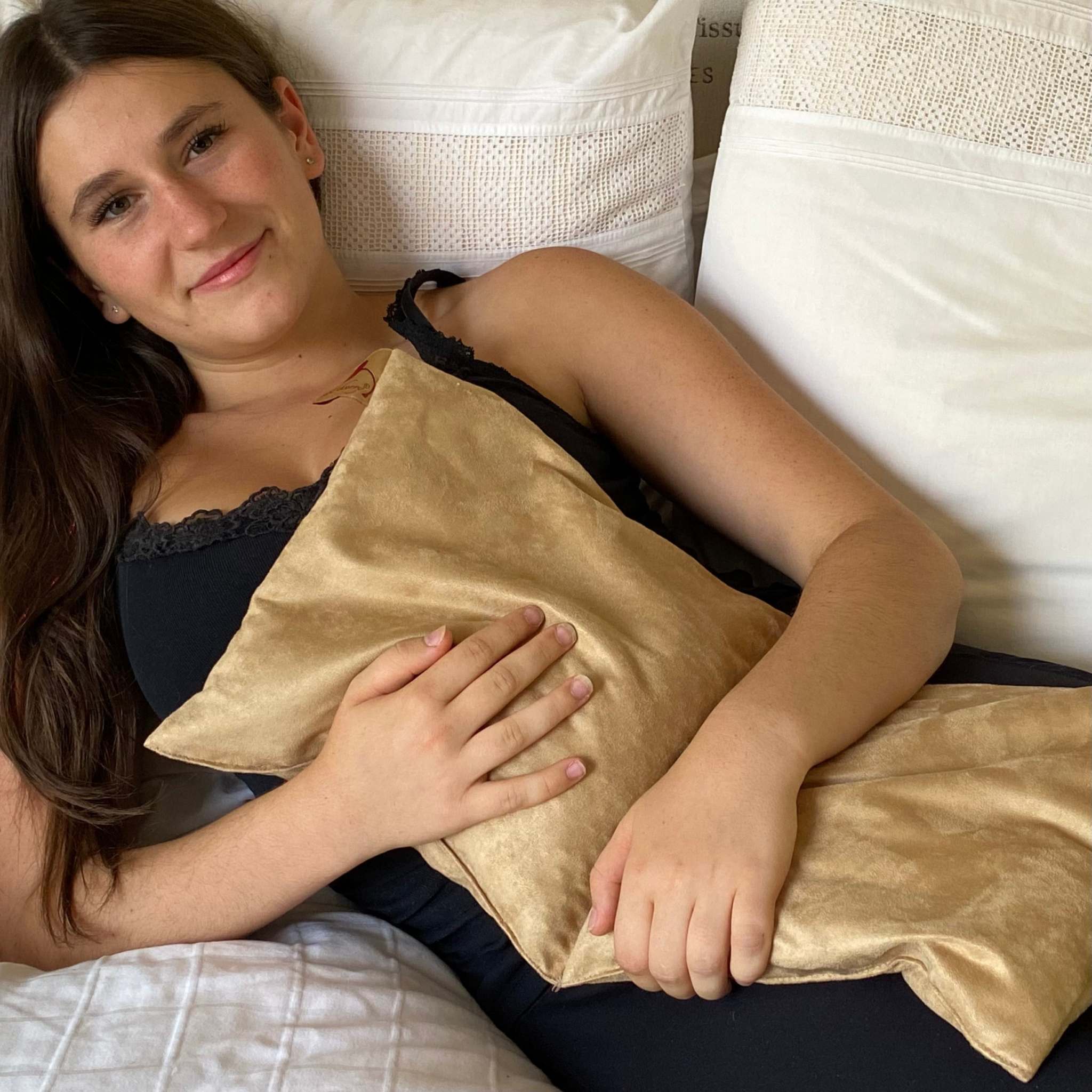 Double Square Cherry Stone Pillow in tan ultra-suede, with a soft plush finish and elongated double-square shape.
