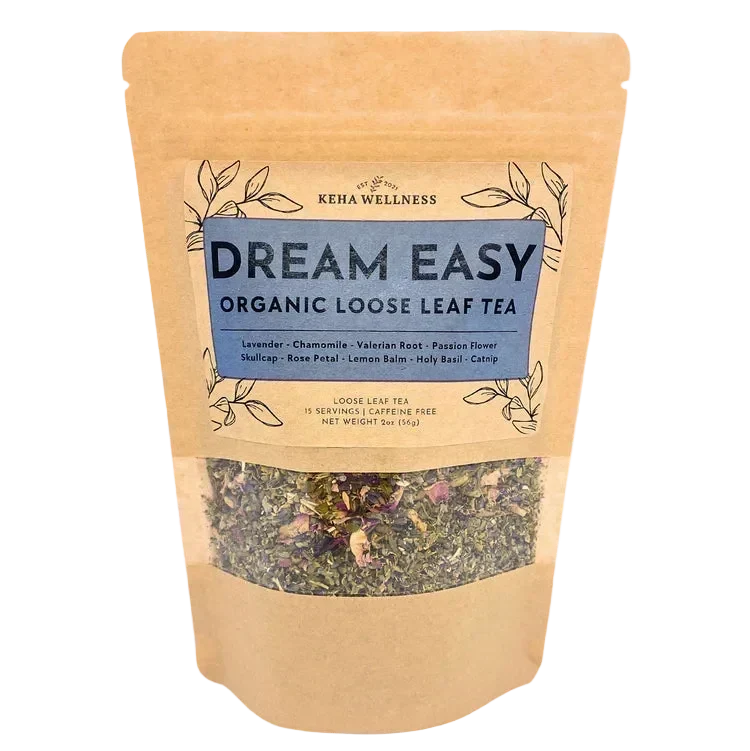 Dream Easy Loose Leaf organic herbal tea in a kraft paper pouch with a blue label featuring chamomile, valerian root, and lavender blend visible through window