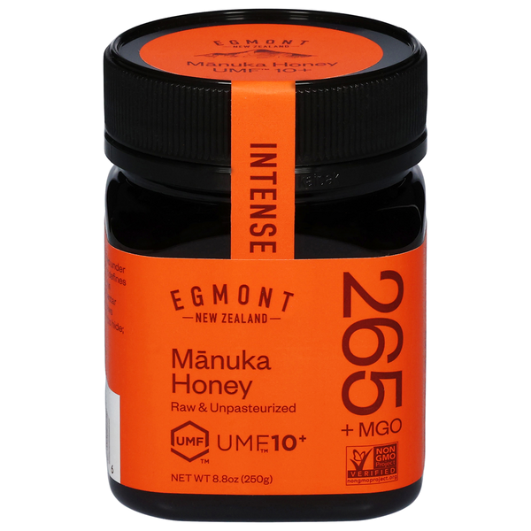 Egmont Manuka Honey glass jar with vivid orange label, black ribbed lid and Intense UMF 10+ marking