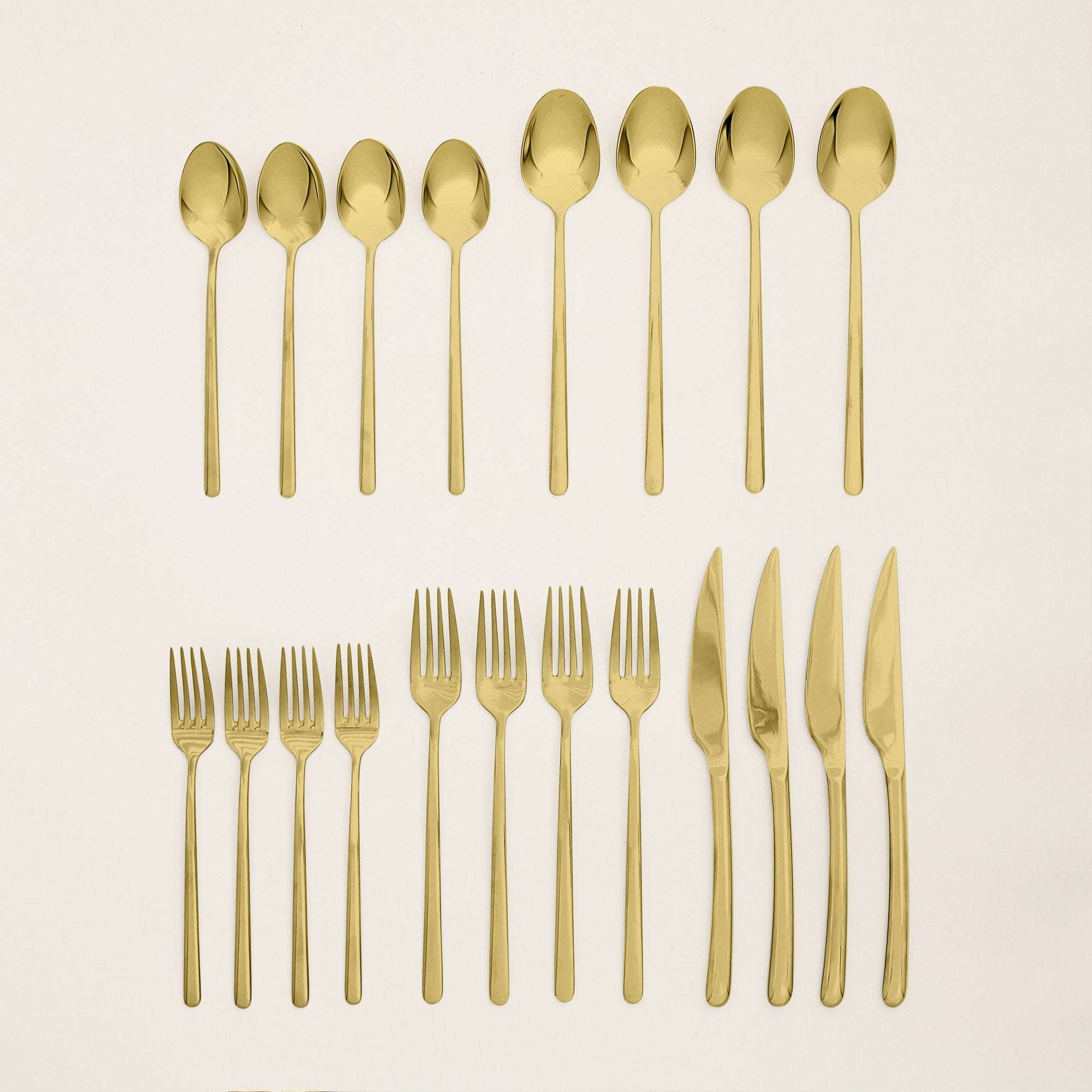 Emilia Mirror 20-Piece Flatware Set in gold-toned mirror-finished stainless steel with sleek contemporary handles