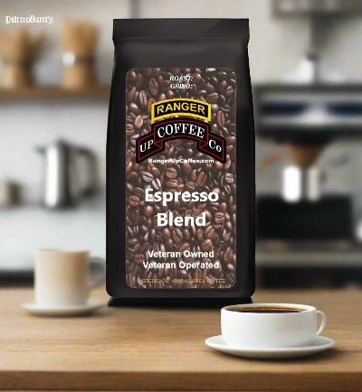 Espresso Blend Coffee in a black bag with a brown coffee-bean label, shown beside a cup of espresso.