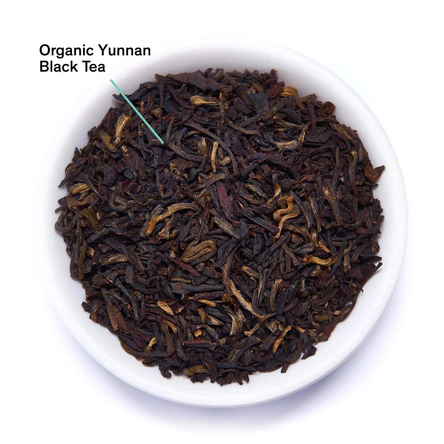 Essentials Black Gold Tea, loose organic Yunnan black tea with dark twisted leaves and golden tips