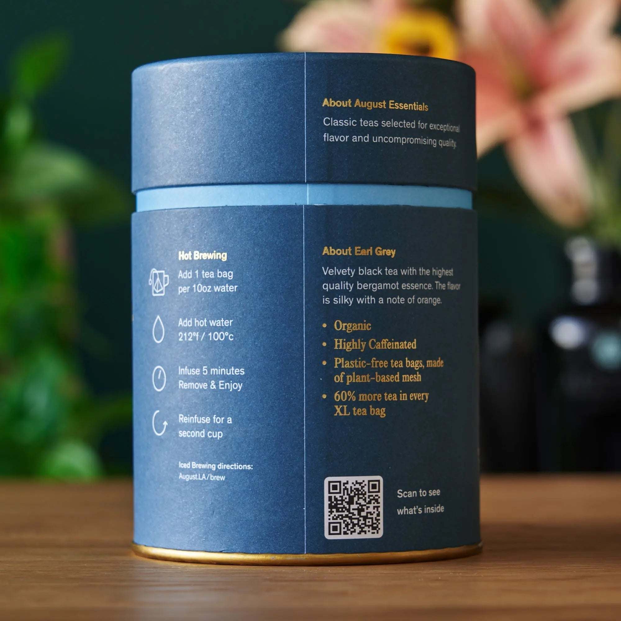 Essentials Earl Grey Black Tea in a blue cylindrical tin with black label and gold text