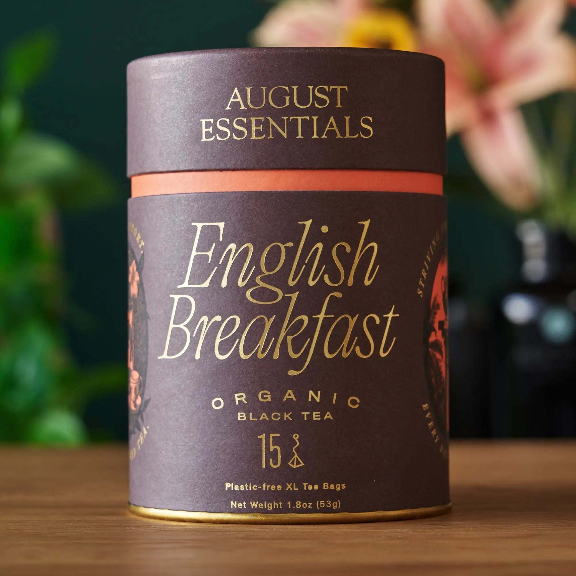 Essentials English Breakfast Black Tea organic black tea in a dark cylindrical tin with 15 tea bags