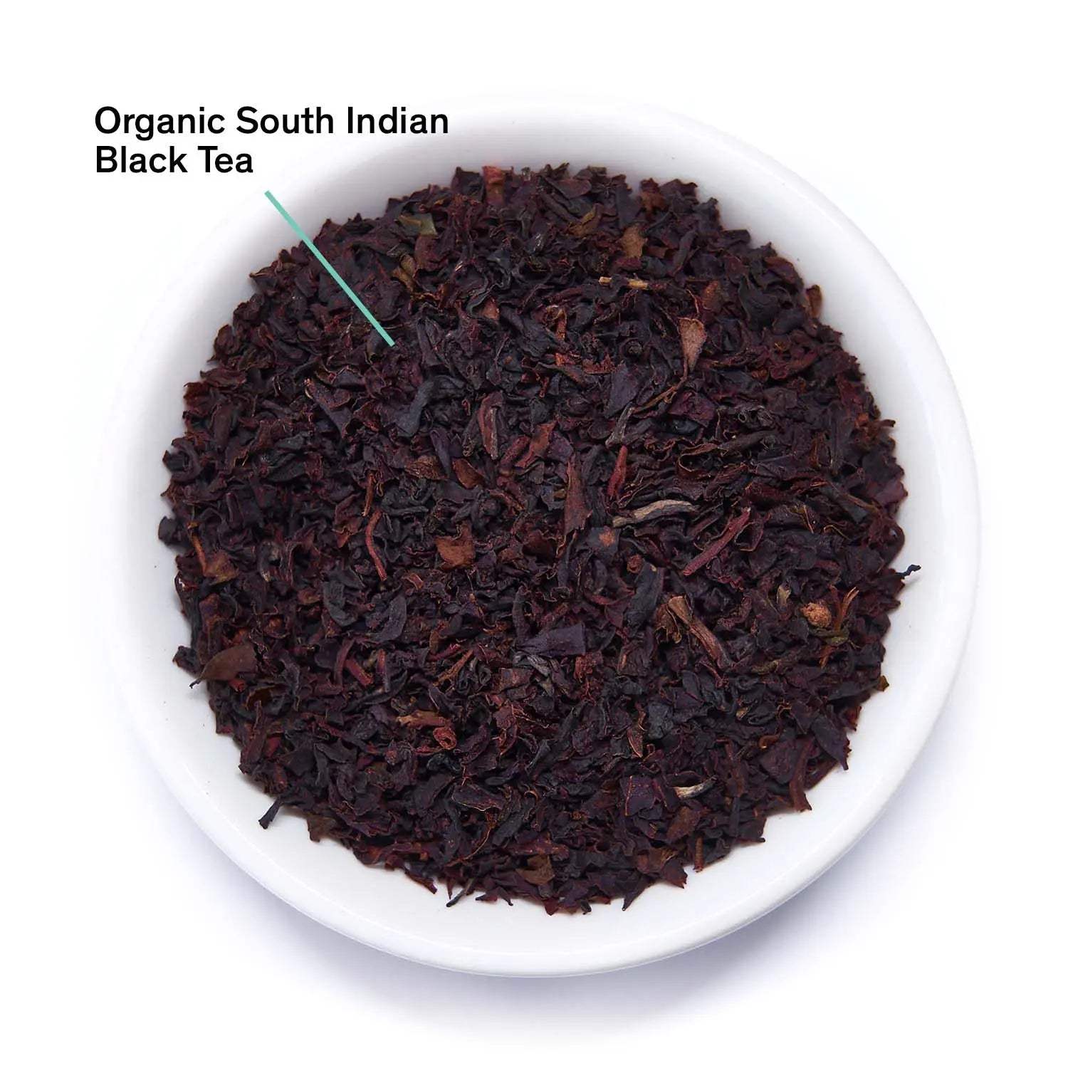 Essentials English Breakfast Black Tea, loose organic South Indian black tea leaves in a white dish